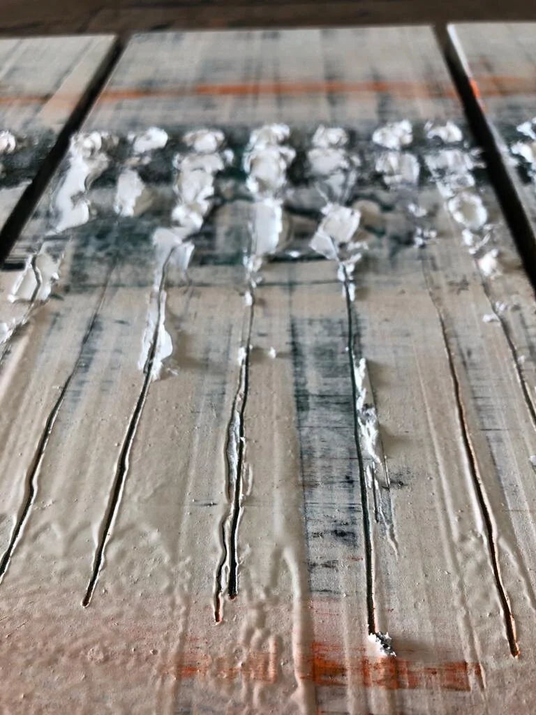 A close up photo showing artwork panel textures