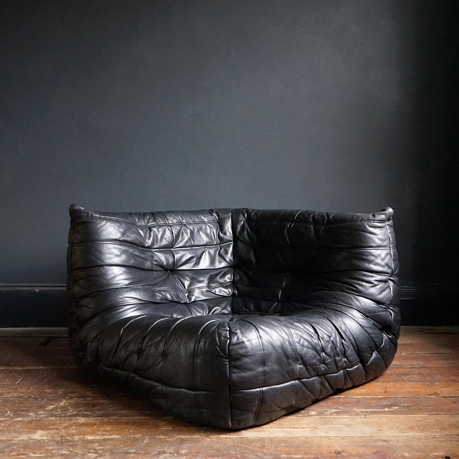 Vintage original Togo black leather armchair by Michel Ducaroy for