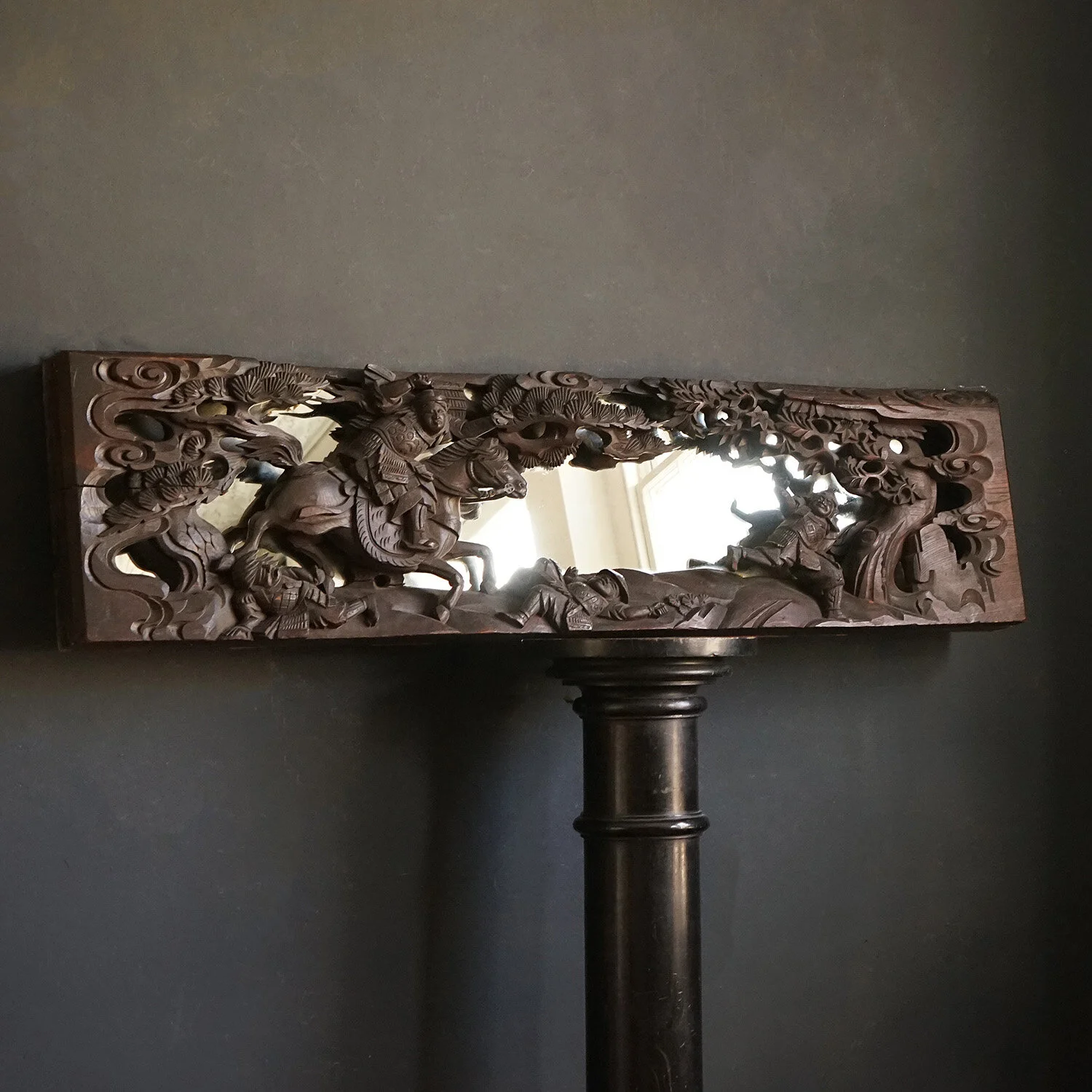 Antique Heavily Carved Wooden Chinese Mirror Depicting a Battle Scene