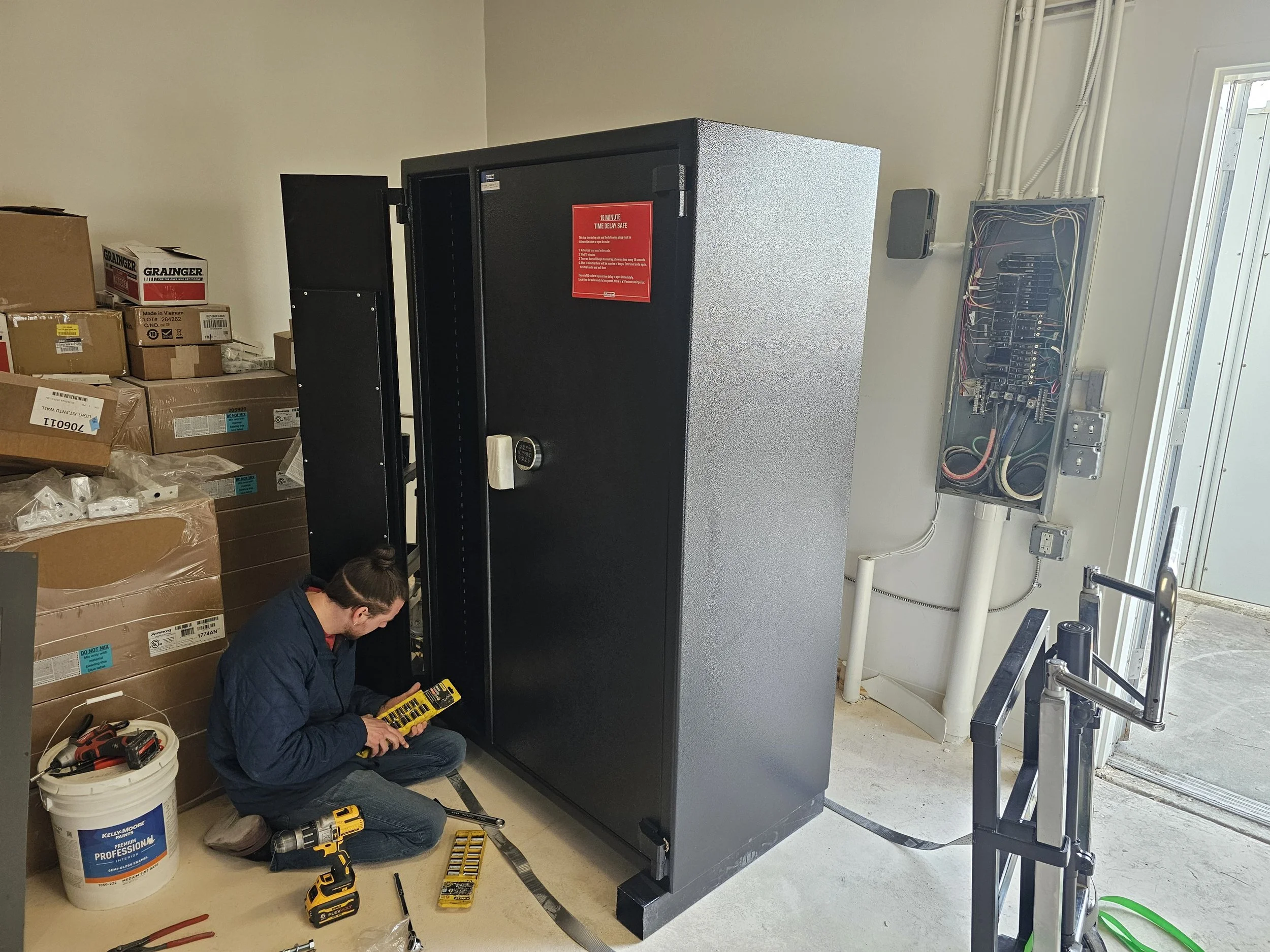Locksmith repairing a safe in Utah.