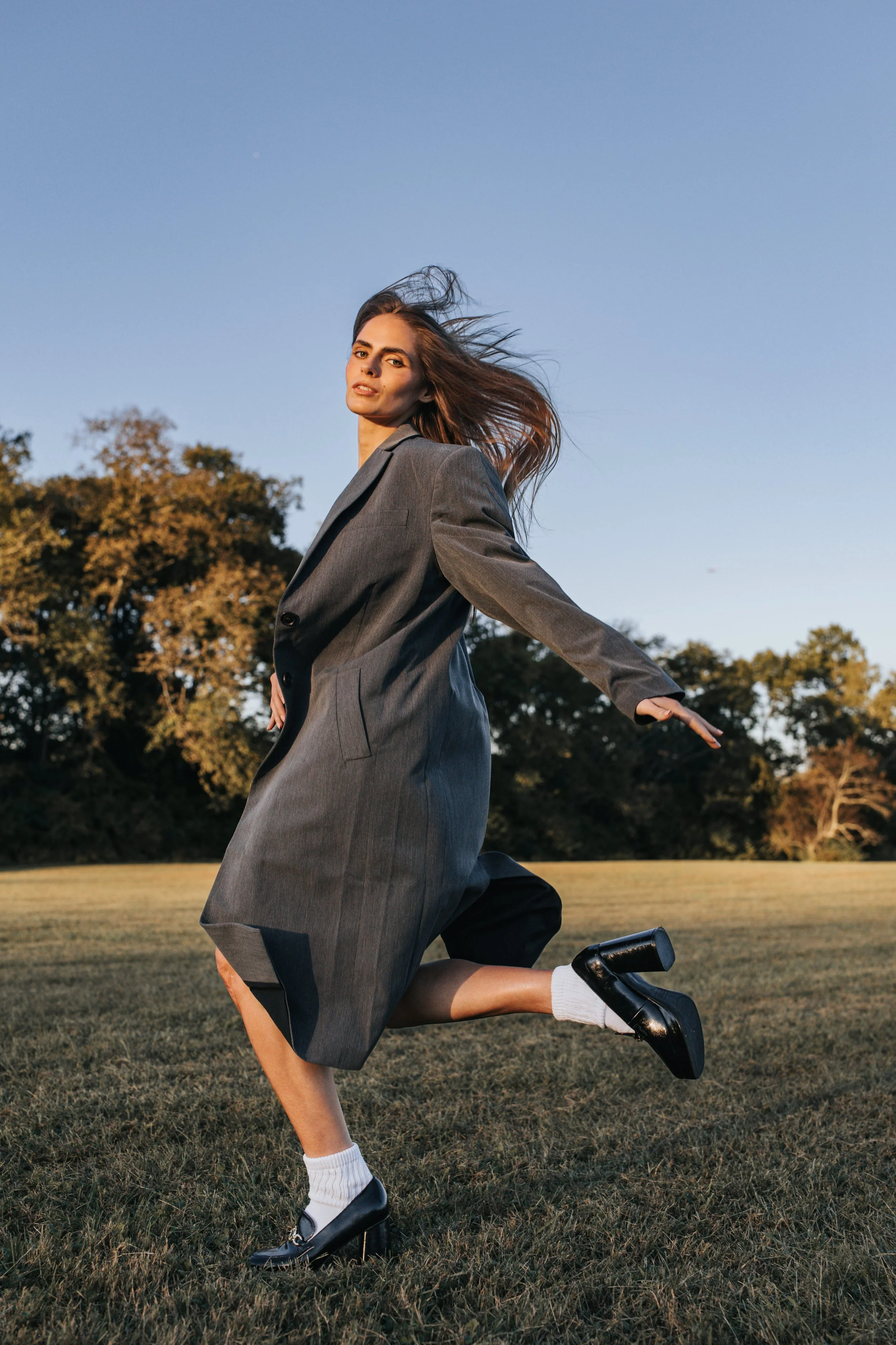  Model Skylar poses in a long grey coat during her Nashville fashion photoshoot. 