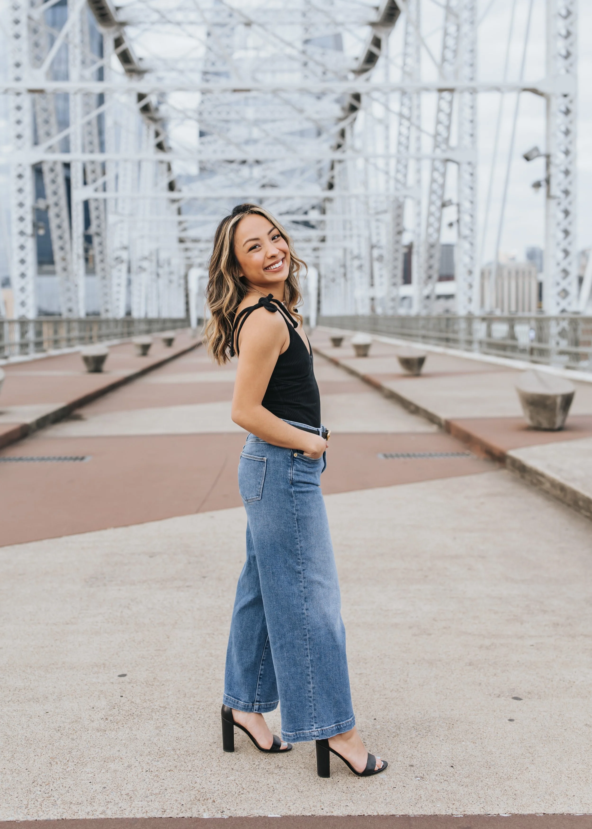  Kait posing for photos on the Pedestrian Bridge 