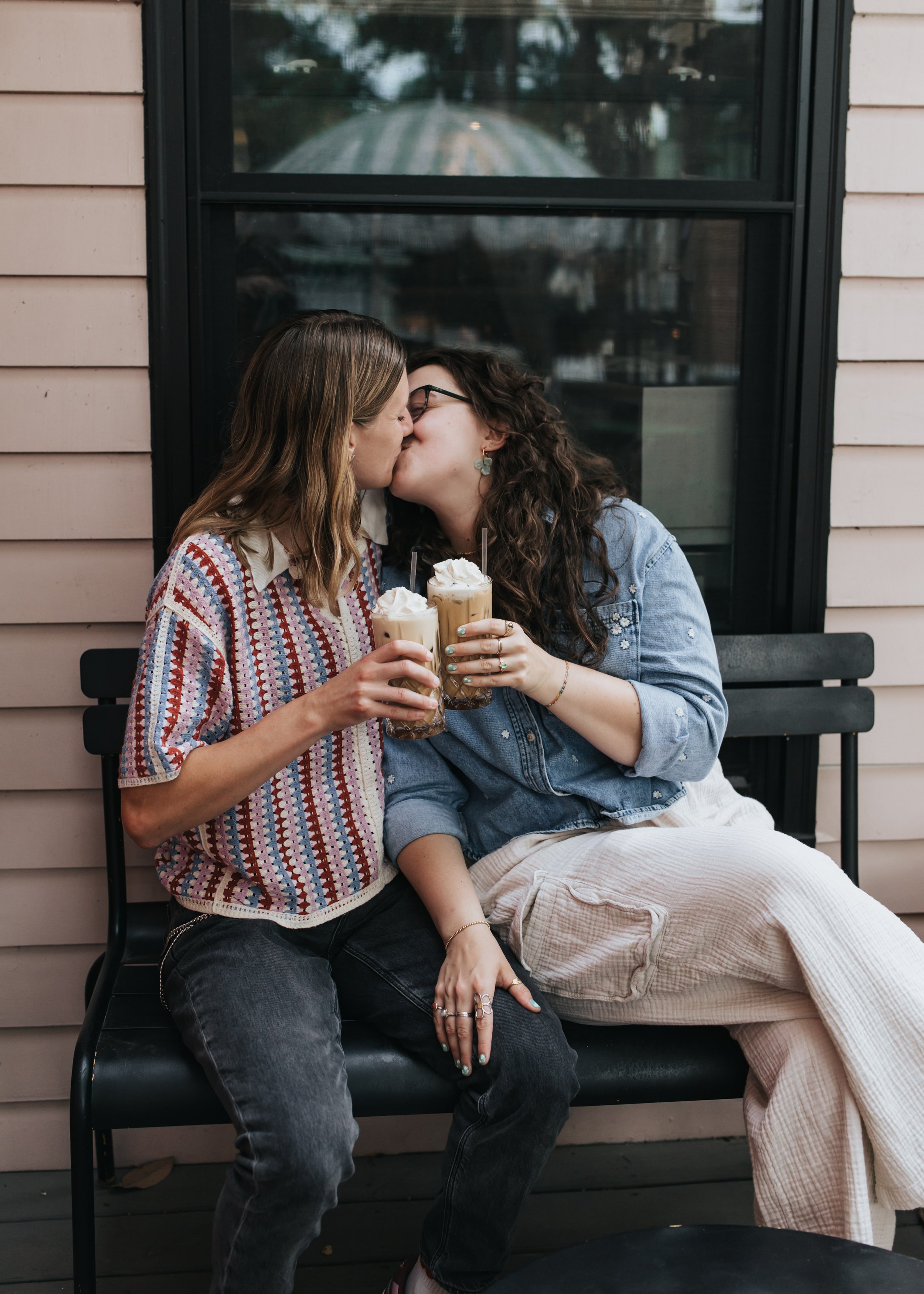  Maddie and Sarah photographed while kissing during their LGBTQ+ engagement photoshoot in Nashville. 