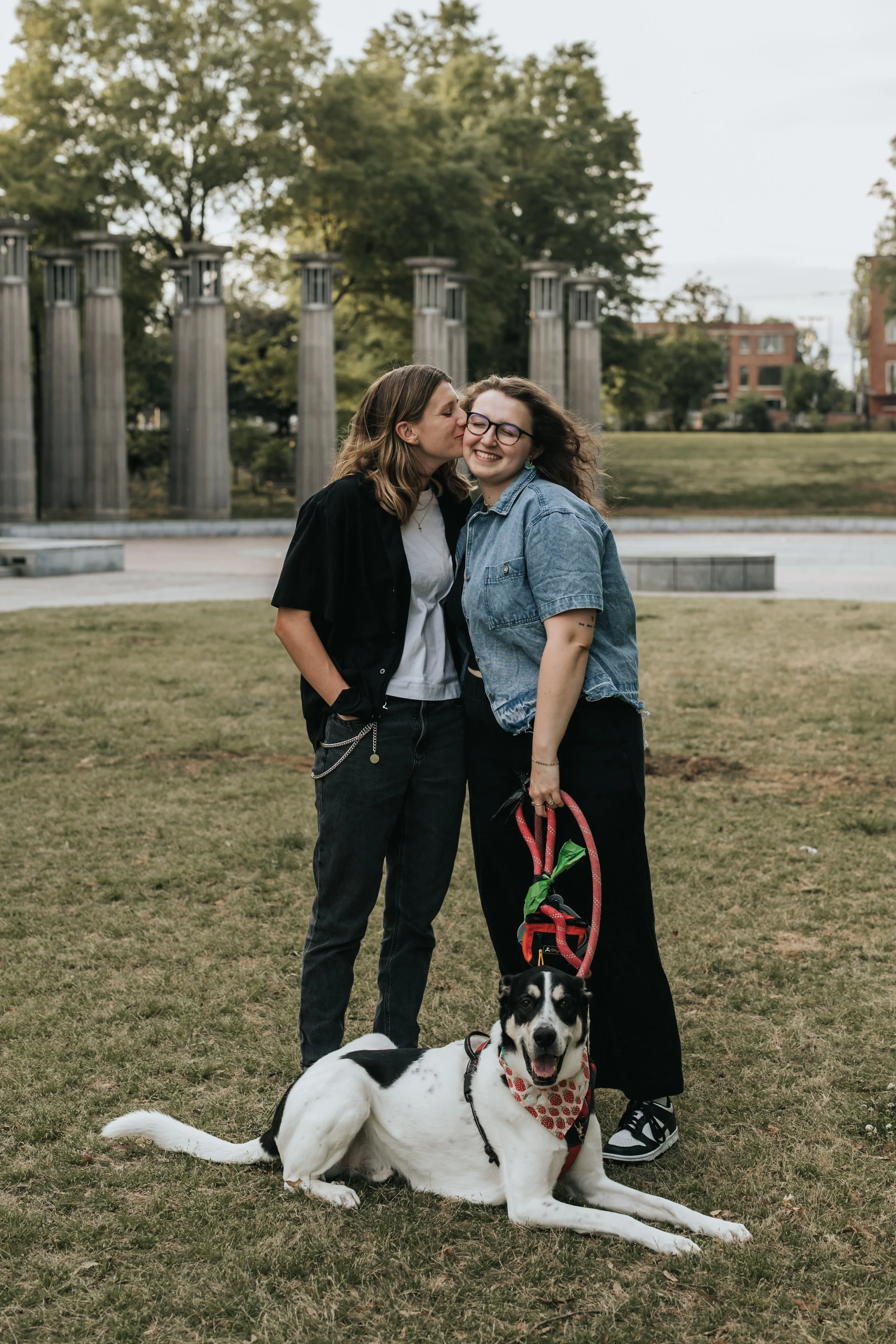  Maddie, Sarah, and their dog Bear at Bicentennial Park during their engagement photoshoot. 