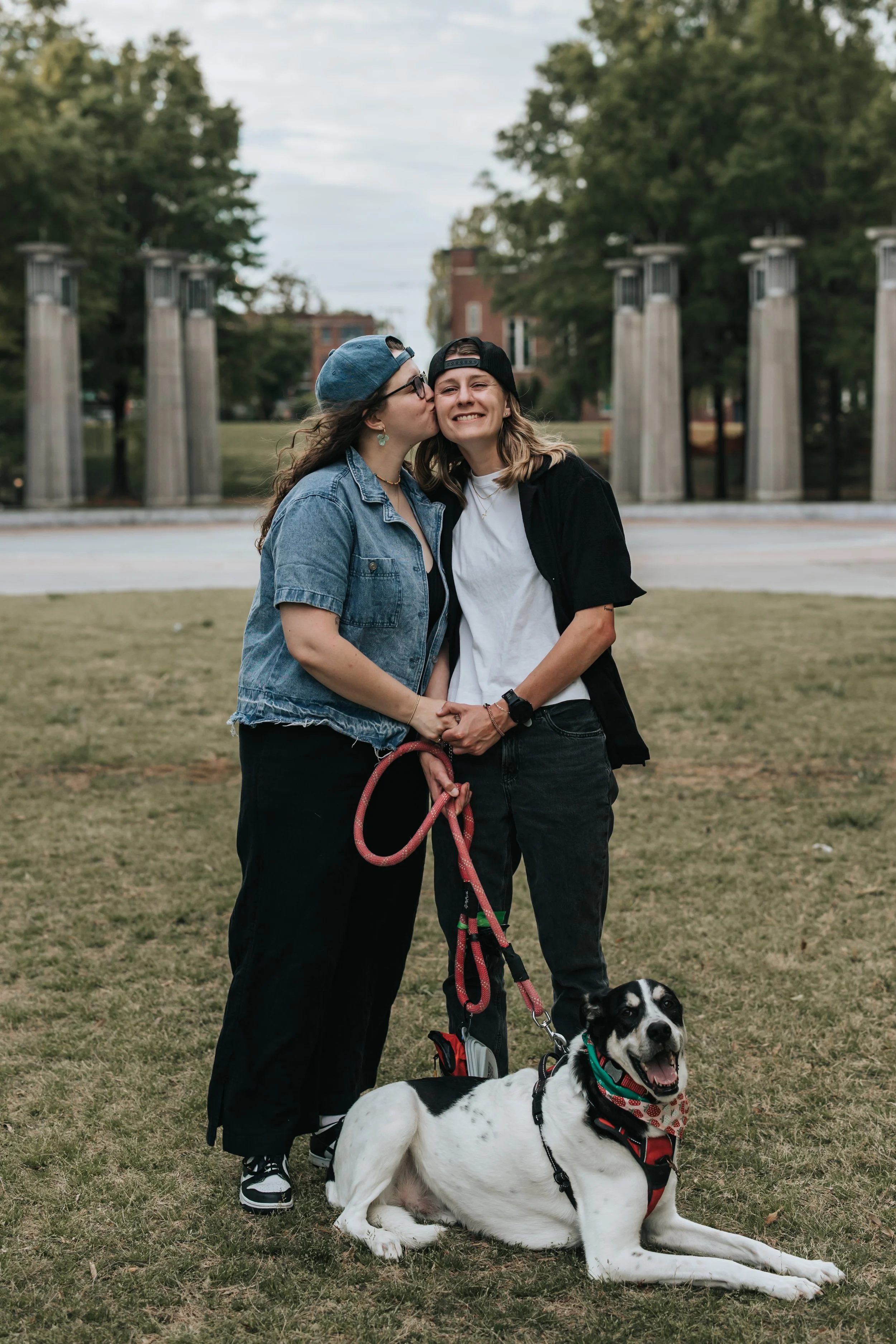  Maddie, Sarah, and their dog Bear at Bicentennial Park during their engagement photoshoot. 