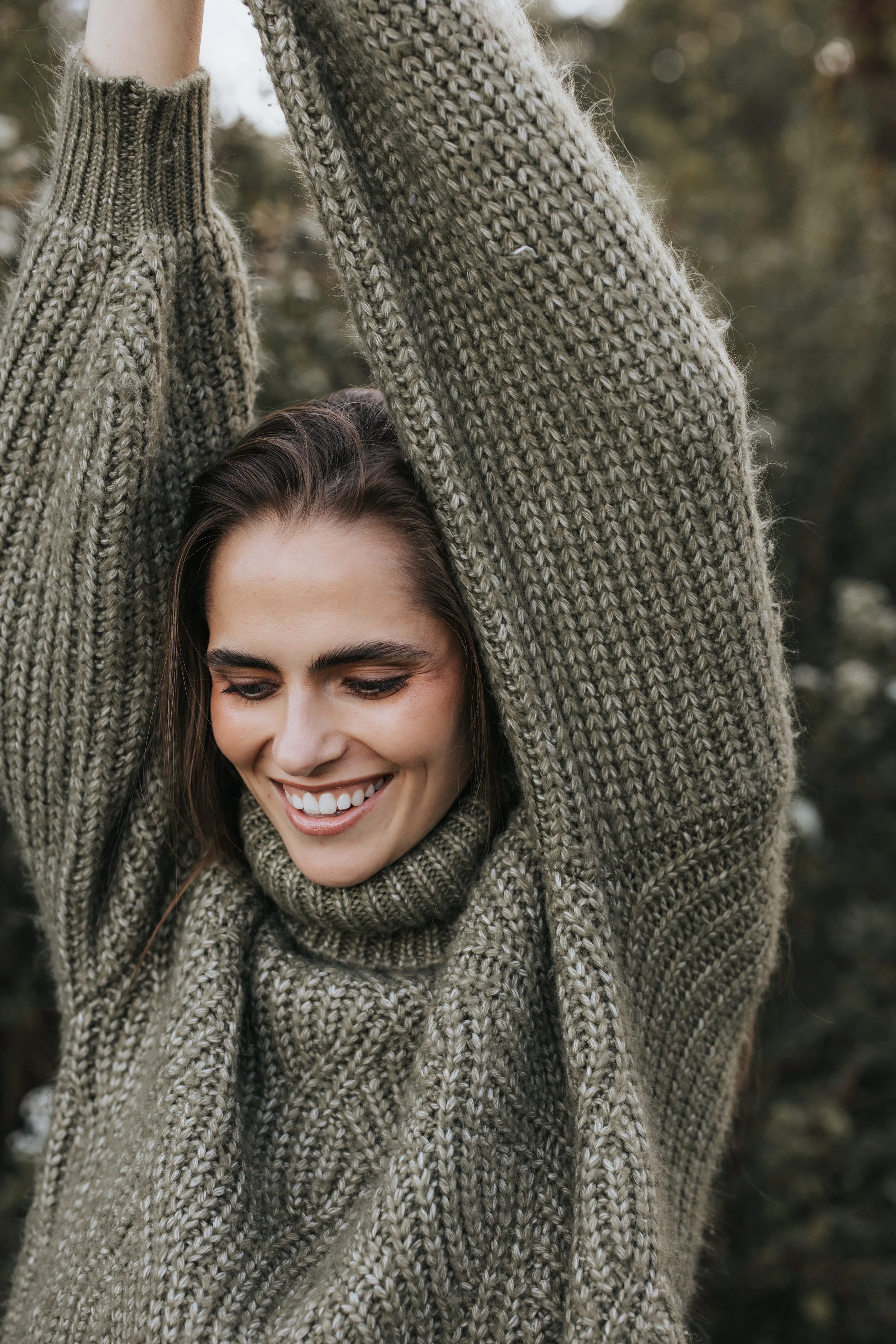  Model Skylar smiles in a green sweater during her Nashville fashion photography test shoot. 