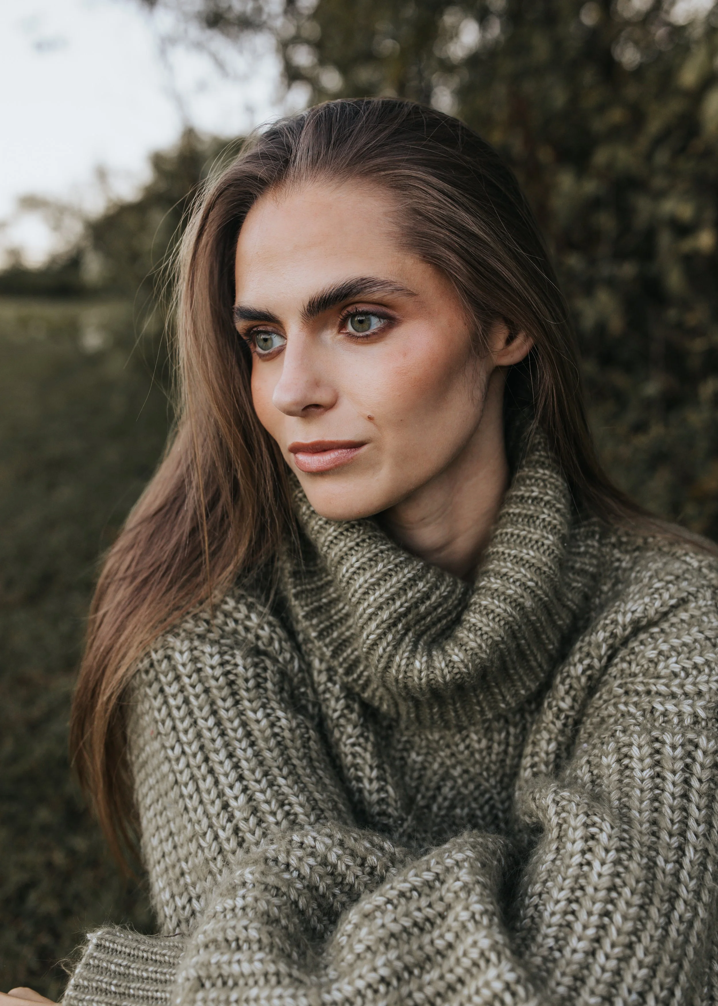  Model Skylar poses in a green sweater during her Nashville fashion photography test shoot. 