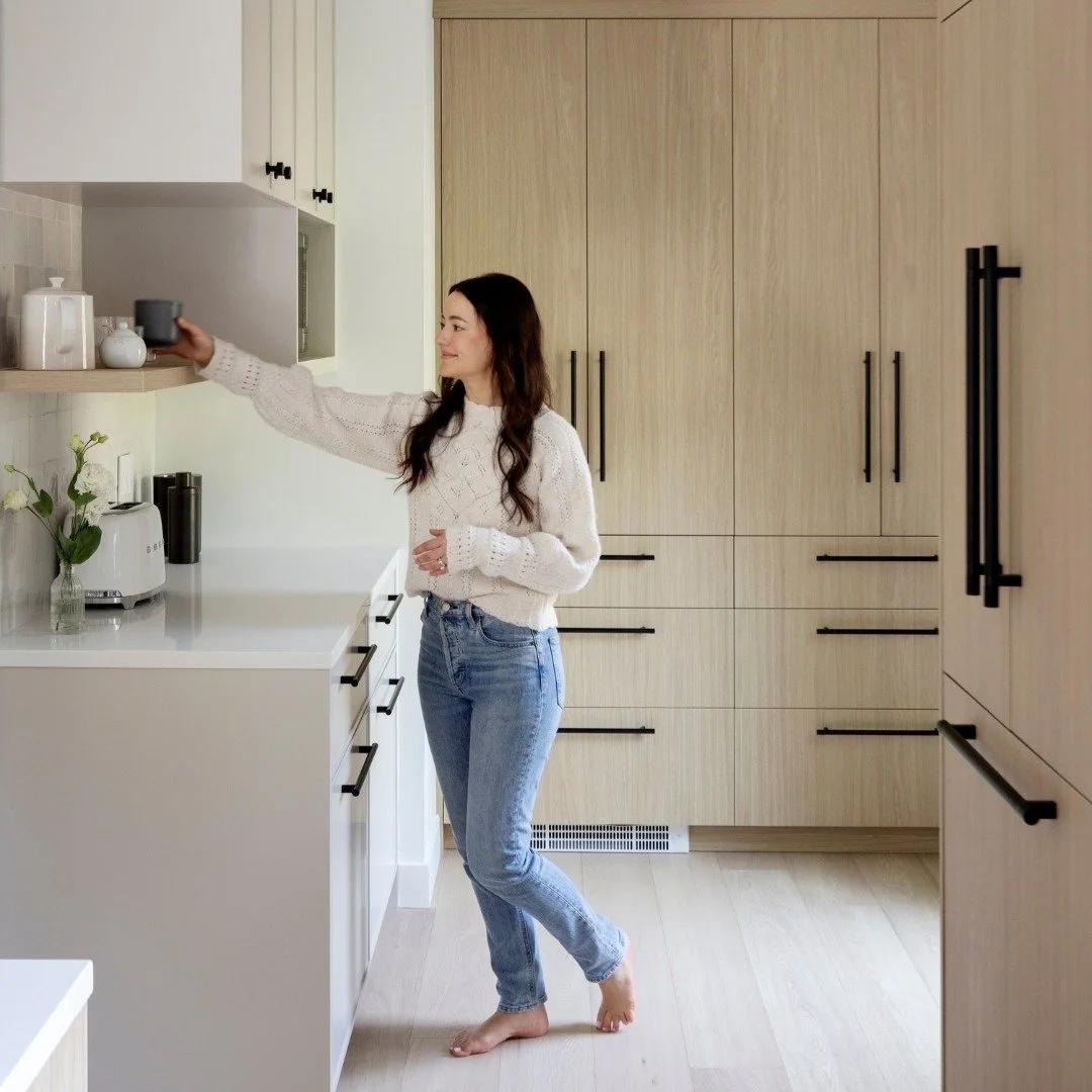 Before, this kitchen was visually heavy and spatially underperforming.

Now, every element supports the way this family lives and hosts.

We relocated the fridge to improve workflow, moved the laundry upstairs for daily ease, and transformed its form