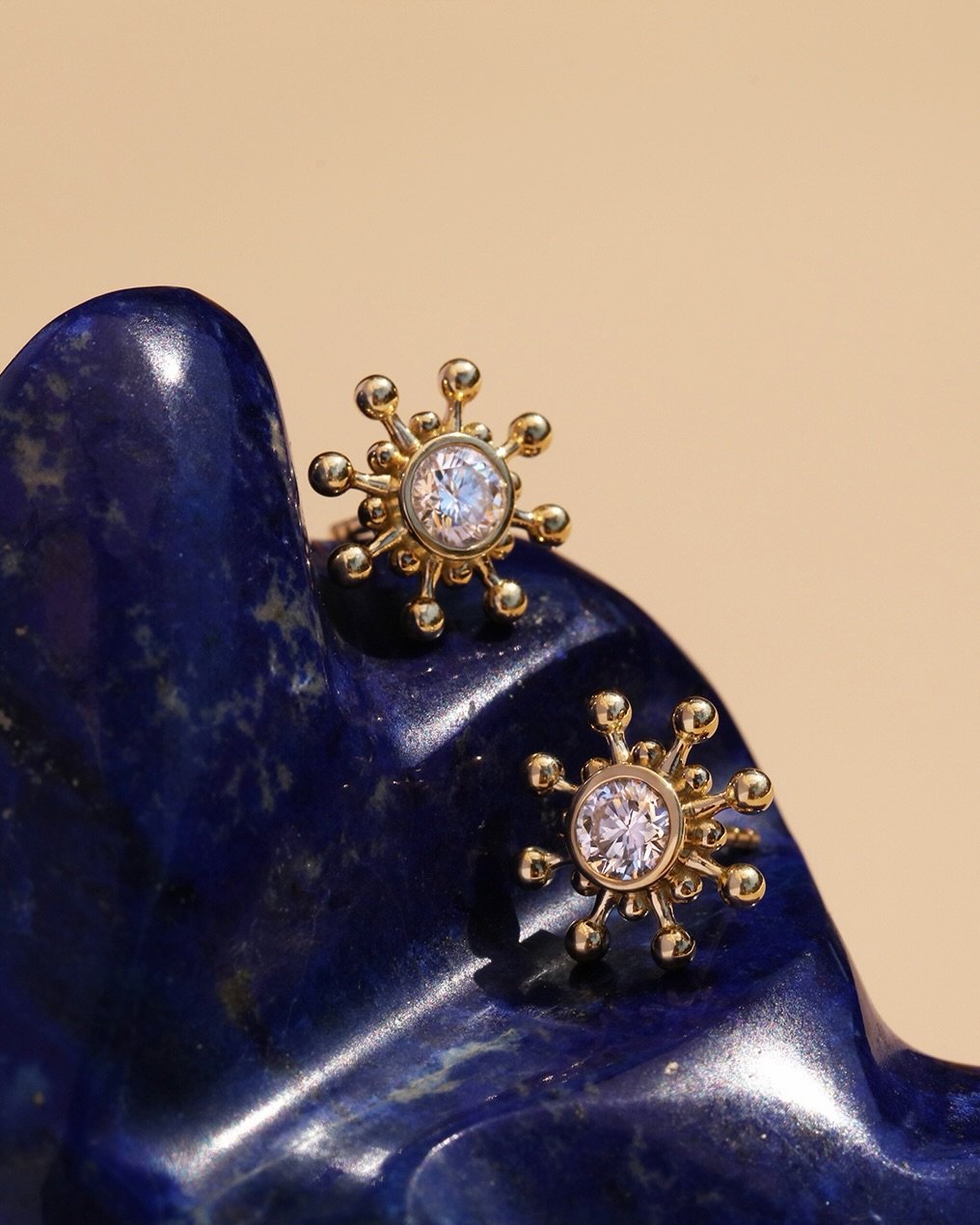 Our Diamond Bibi Studs, radiant bursts of light and fire.✨

Made to be worn alone or layered with any of our other symbol earrings. 

How would you wear yours?💫

#Mazahri #ethicallymade #futureheirlooms #jewelrywithmeaning #diamondsandgold