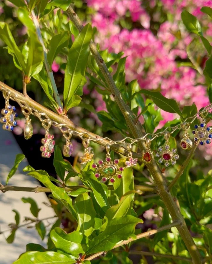 Our flora charms are ready for spring on our Zan Foundational chain. Mix and match the blossom&mdash;Flower Cosmos, Pomegranate, Tulip, Lotus, or Botah&mdash;and gemstone combination that tells your unique story. 

Which ones resonate with your heart