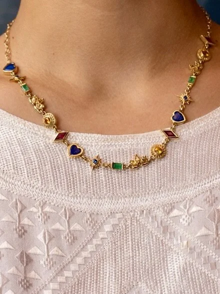Our Rainbow Gem Symbols Necklace made of ruby Zans, orange sapphire Sunbursts, yellow sapphire Lotuses, emerald Bars, blue sapphire A&iuml; Khanum Stars and lapis lazuli Hearts❣️

A strand of our most meaningful motifs to carry with you always. Repre