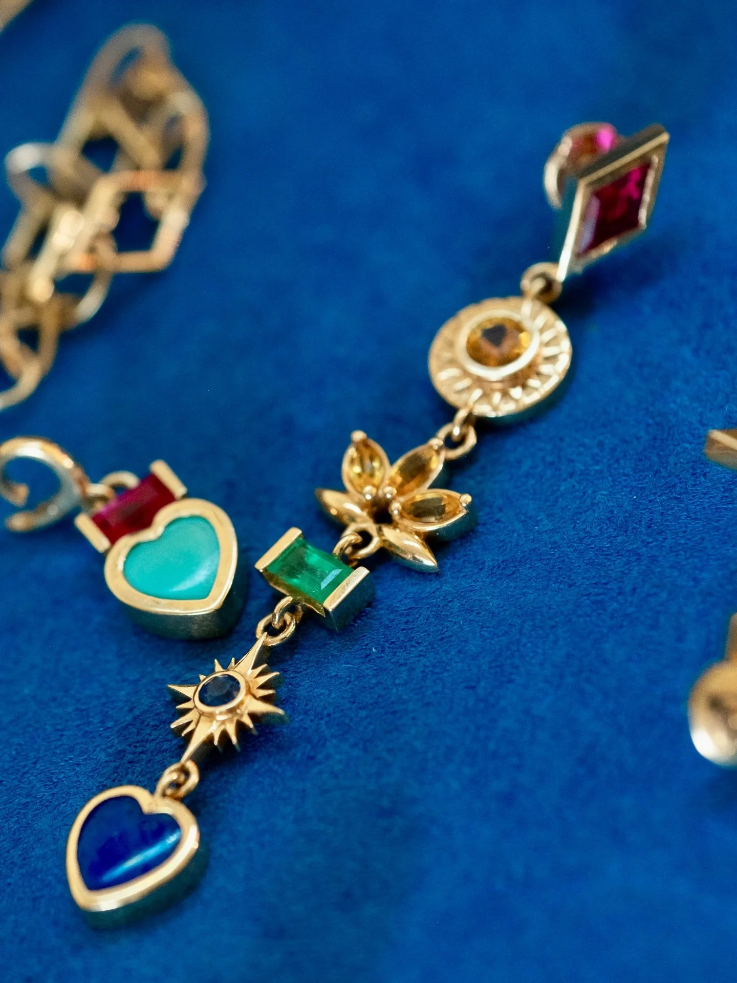 Our Rainbow Gem Symbols Earrings in ruby, sapphire, emerald, and lapis set in 18k Fairmined gold. Each color aligned with a chakra and represented in our signature Mazahri symbols as a gentle reminder of joyful balance. 🌈🧿✨

#Mazahri #ethicaljewelr