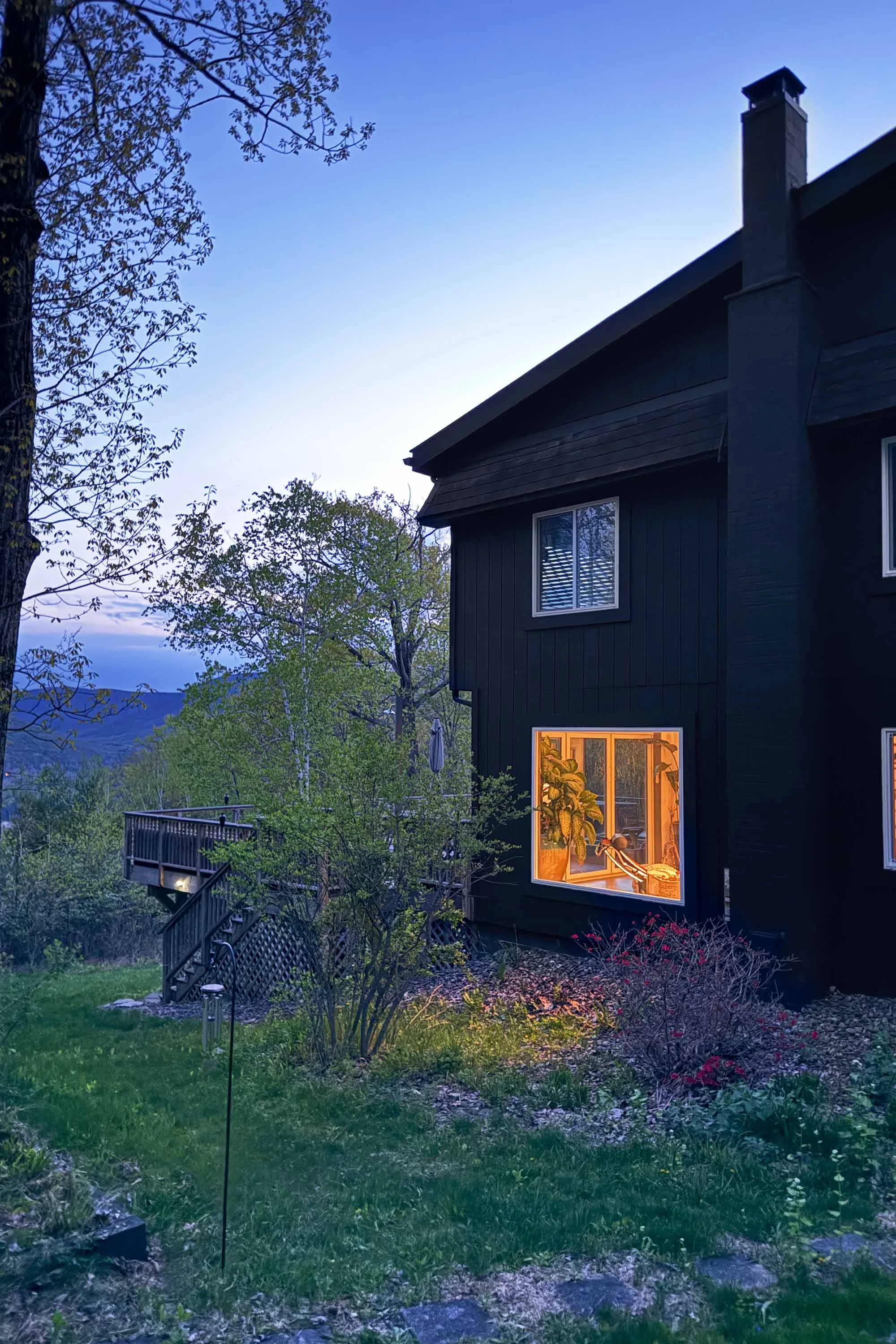 stylish-mountain-house-with-reservoir-views-dusk.jpg