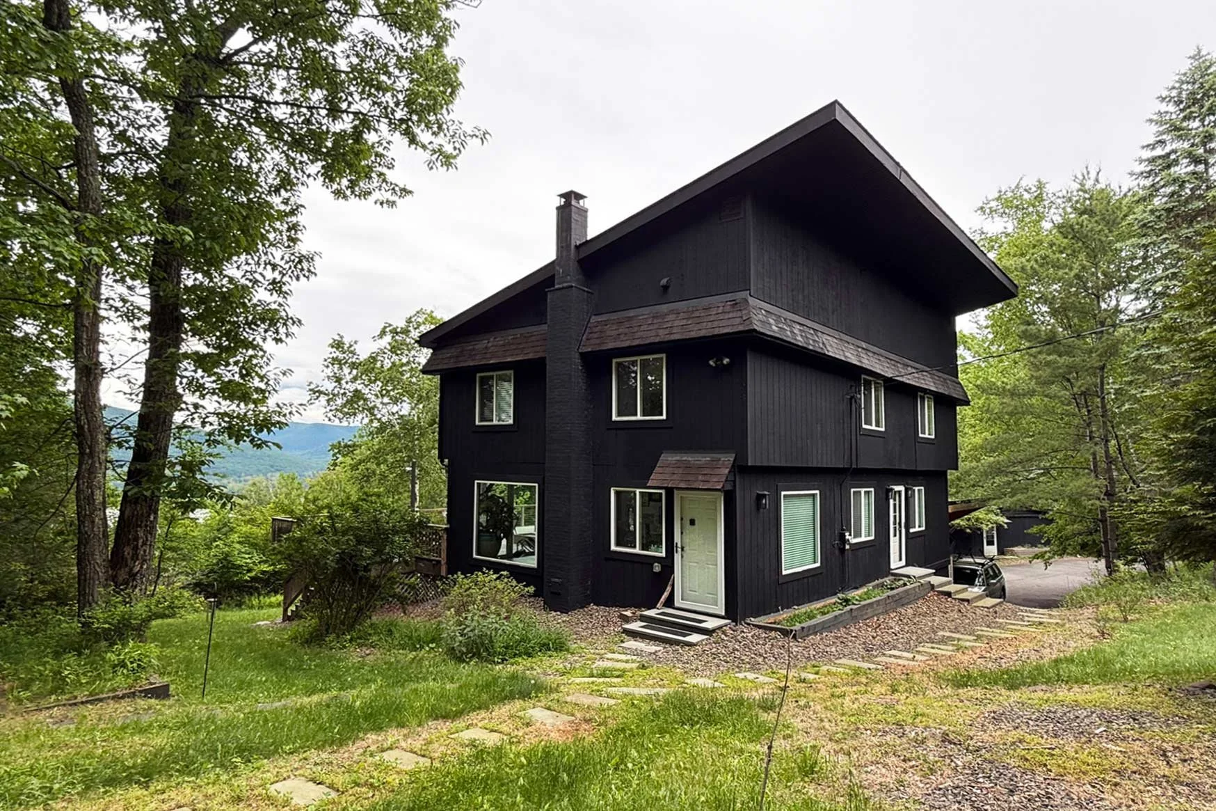 stylish-mountain-house-with-reservoir-views-main-Summer.jpg
