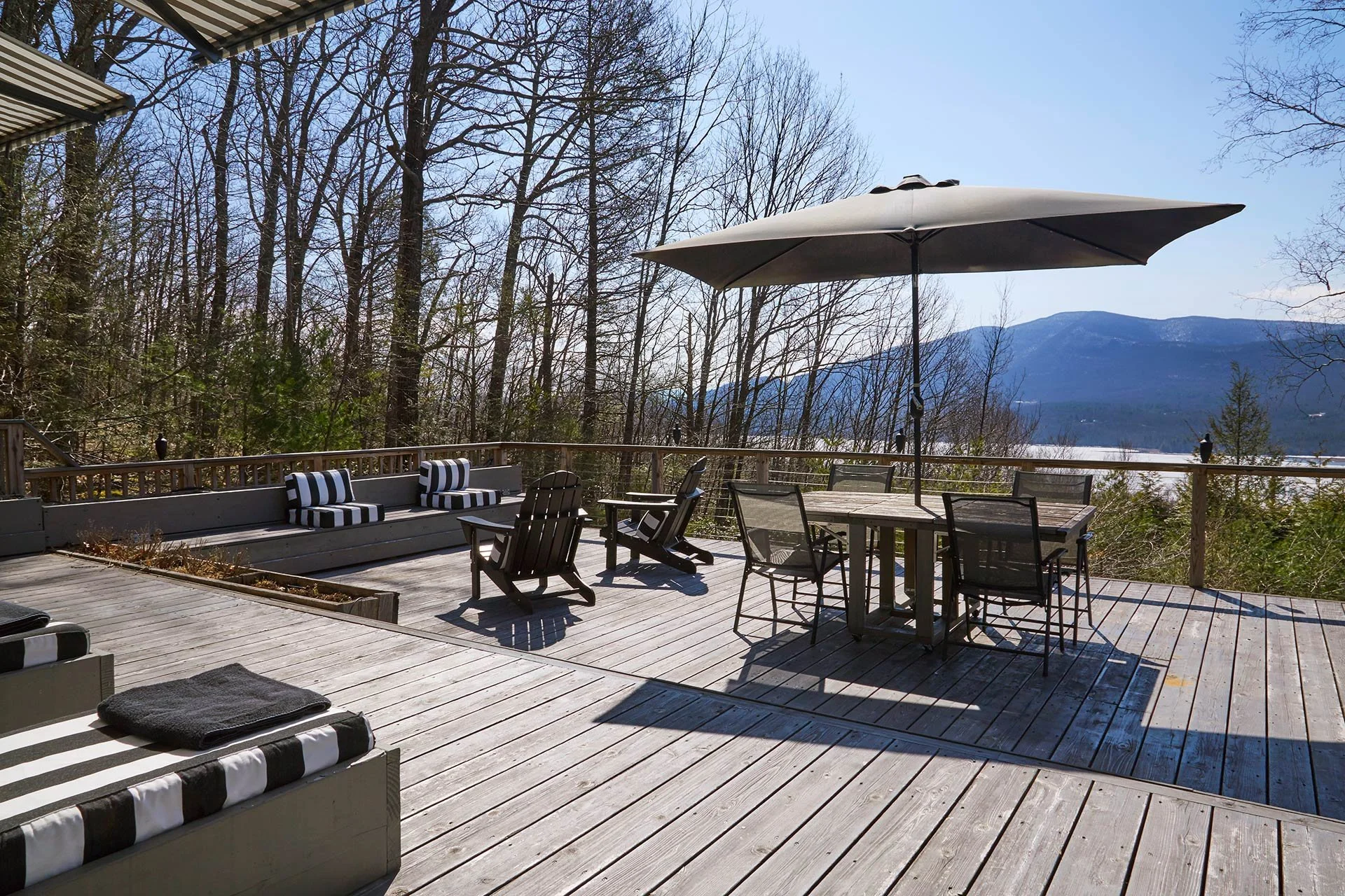 stylish-mountain-house-with-reservoir-views-deck-loungers.jpg