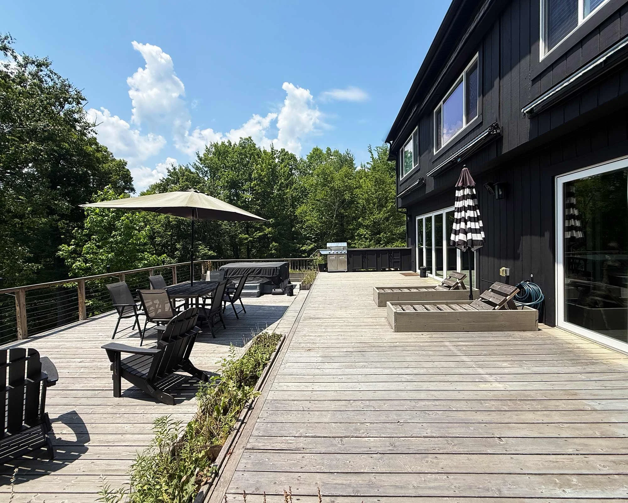 Stylish-mountain-house-reservoir-views-deck-summer.jpg
