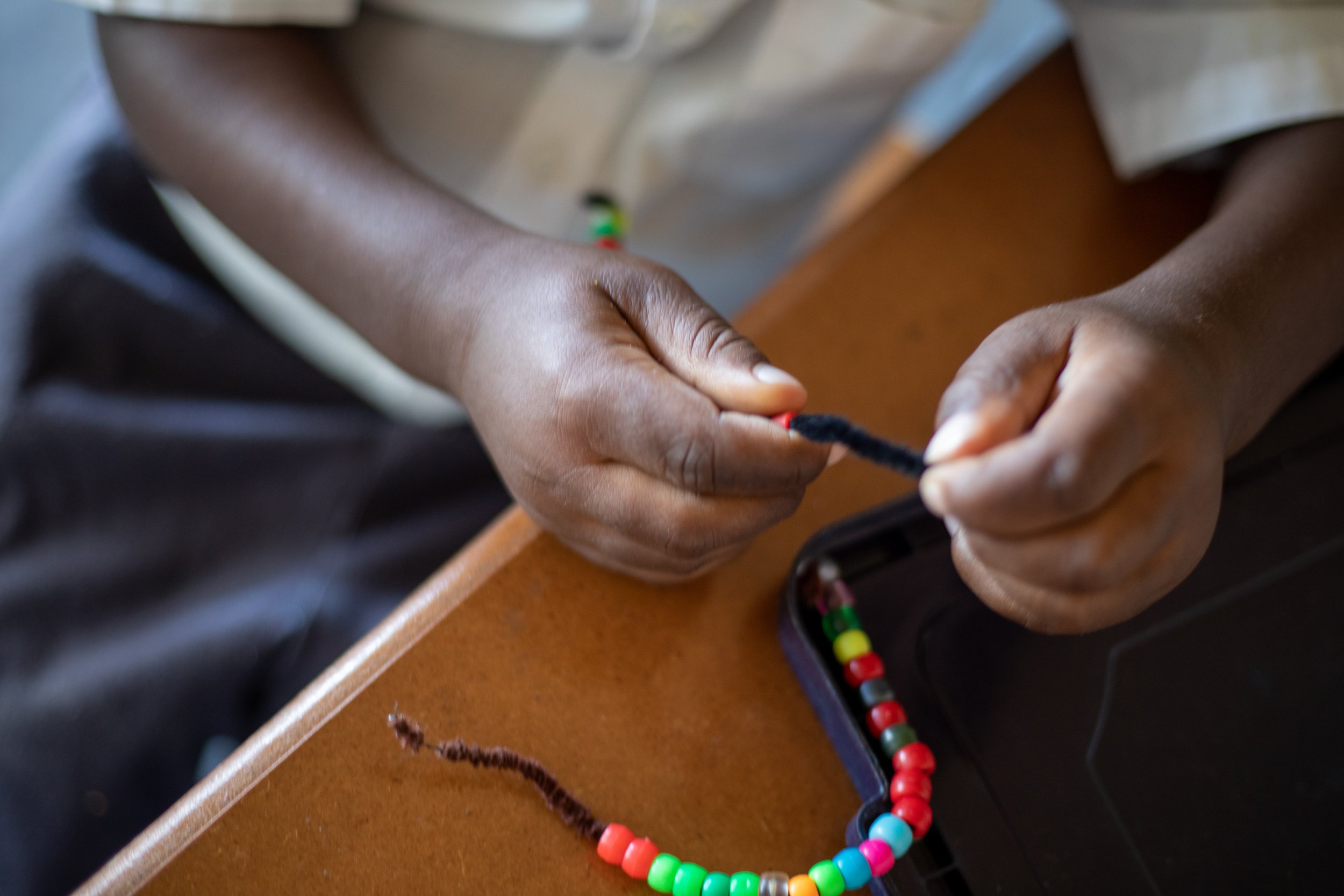 hands and. beads.jpg