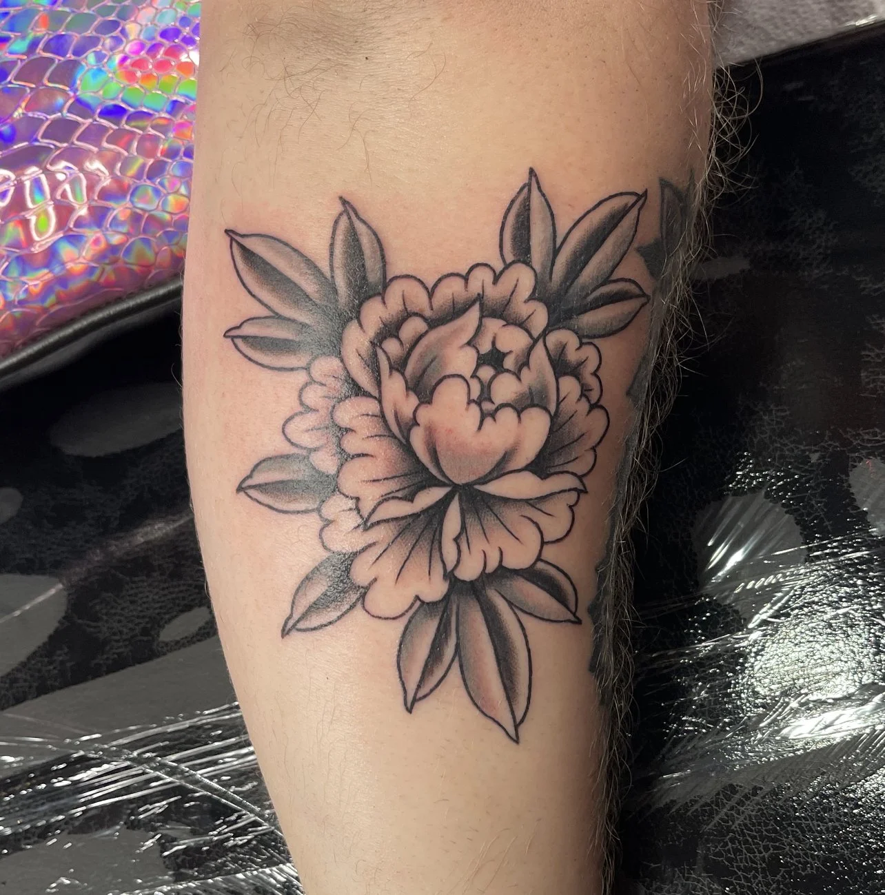 Flower tattoo.