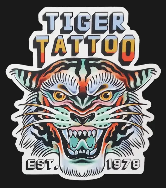 Sticker that says tiger tattoo with a tattoo style image of a tiger.