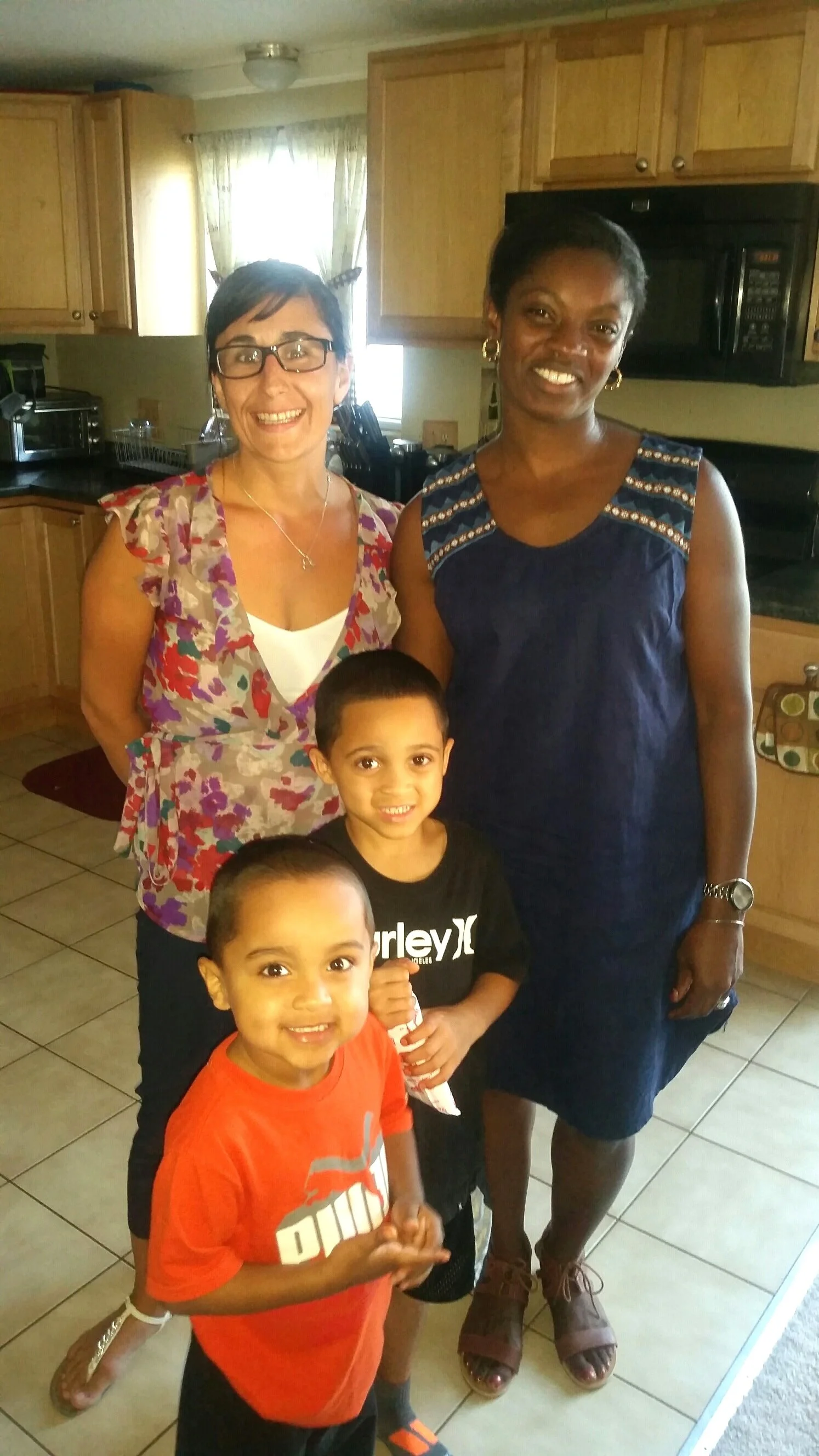 Parent/teacher home visit to Frost Elementary family in Lowell, MA. Courtesy of 1647, 2016.