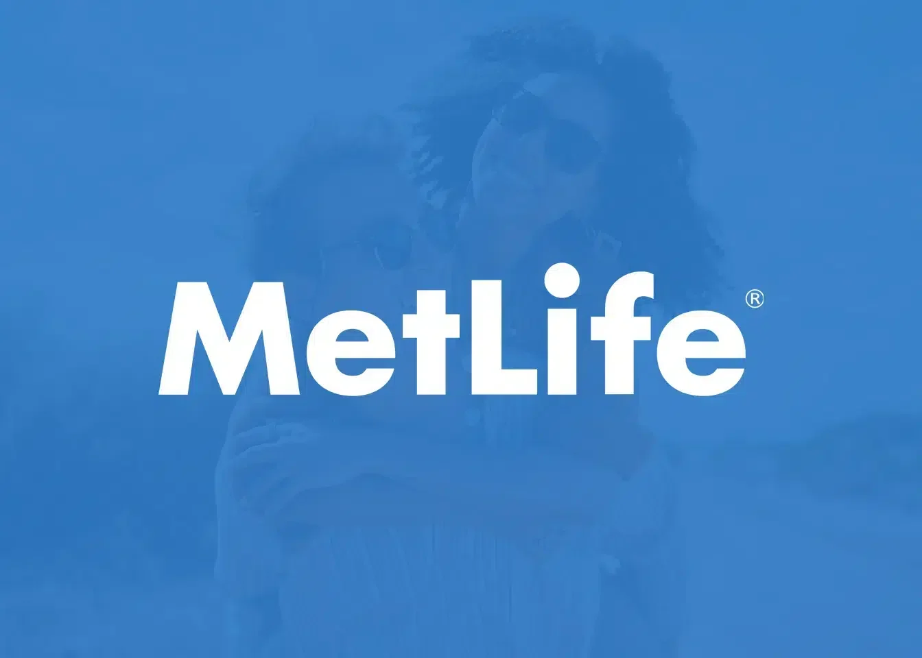 Blue background with the white text 'MetLife' and a faint image of a woman holding a microphone in the background.