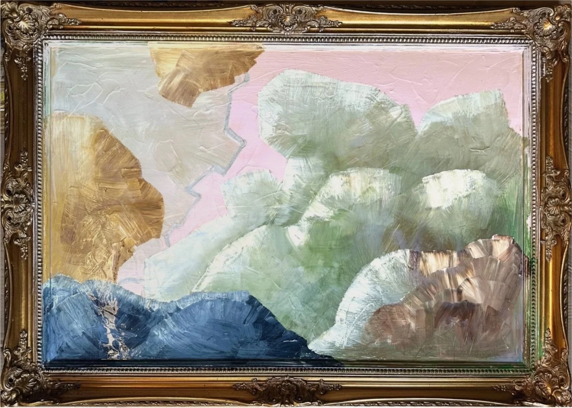 Abstract painting with gold, green, and blue colors in ornate frame