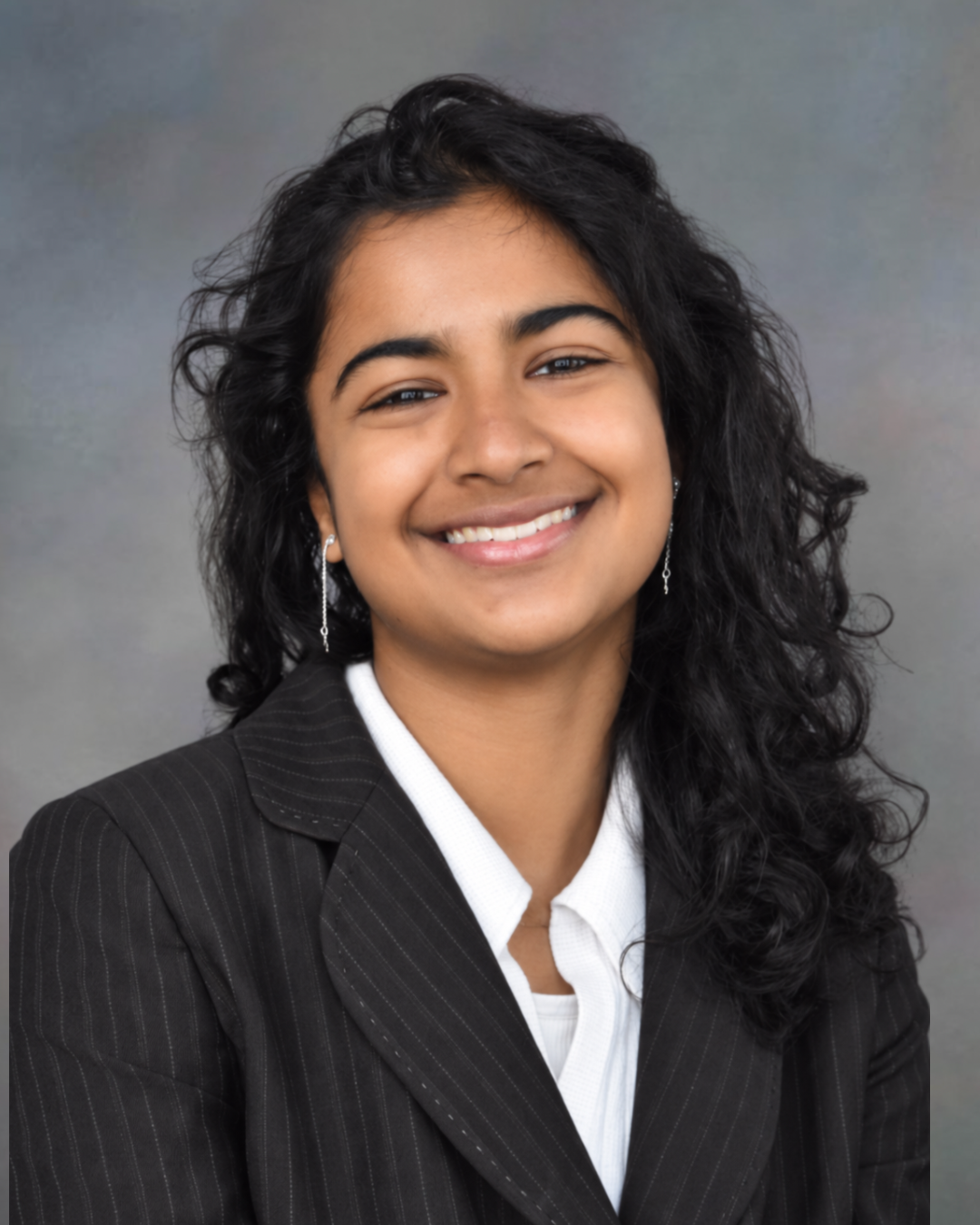 Athulya Siju (she/her)  
Hometown: Philadelphia, PA  
Interests: Cooking, Pickup Basketball, Books, Bouldering, DJing   
School: College of Arts and Sciences  
Graduation Year: 2028  
Major: Philosophy, Politics, and Economics   
Professional Interes