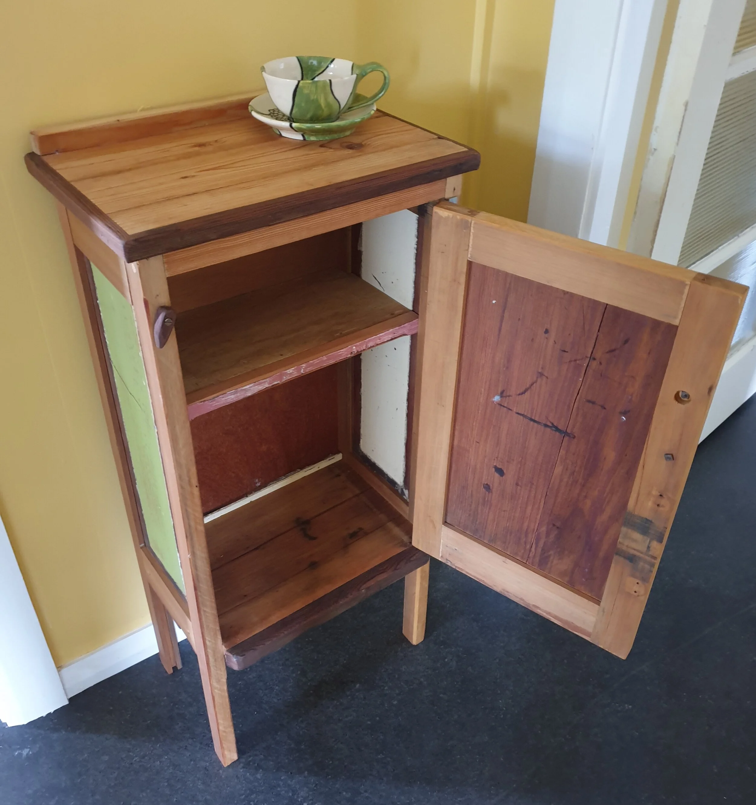 #929 'Ronnie-Cecille' one-door cupboard; pine and redwood, painted sides and bakelite handle; 430 w x 270 d x 880 h; $580