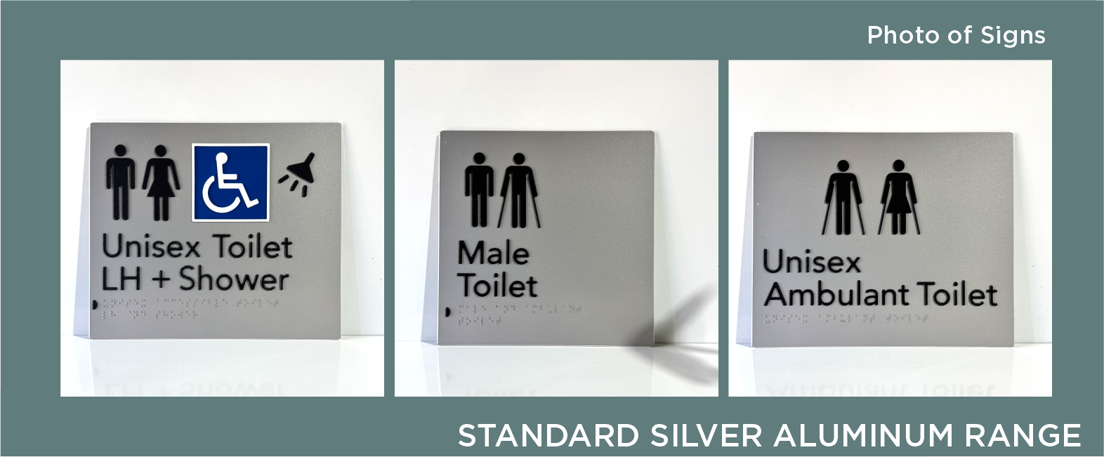 Three silver bathroom signs on a teal background, indicating unisex toilet with shower, male toilet, and unisex ambulant toilet, with braille and black pictograms.