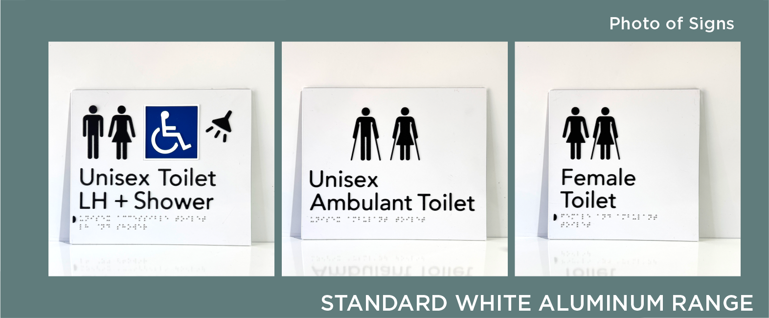 Three signs indicating different restroom types. The first sign is for a unisex toilet with LH shower and wheelchair accessibility; the second sign is for a unisex ambulant toilet; the third sign is for a female toilet. All signs have black icons and text on a white background, displayed on a white surface with a teal-colored background.