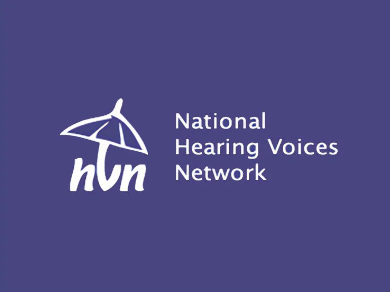 Logo of the National Hearing Voices Network with a white umbrella and the initials 'nhv' on a purple background.