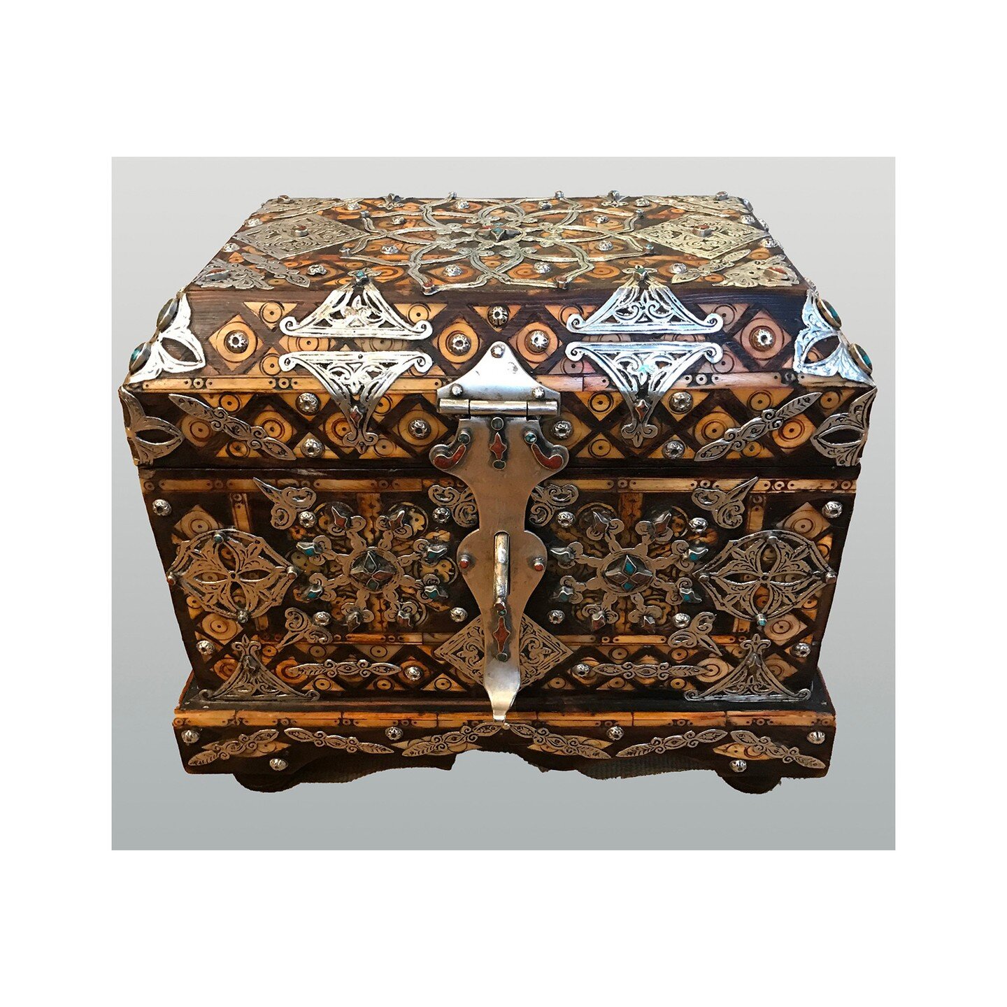 Store all of your treasures in this intricate inlaid Moroccan chest created with wood, sterling silver, camel bone and turquoise. Leather lined. 

#treasures #morocco #moroccanchest 
#jewelbox #exotic #sterlingsilver #wood #camel #turquoise #inlaid #