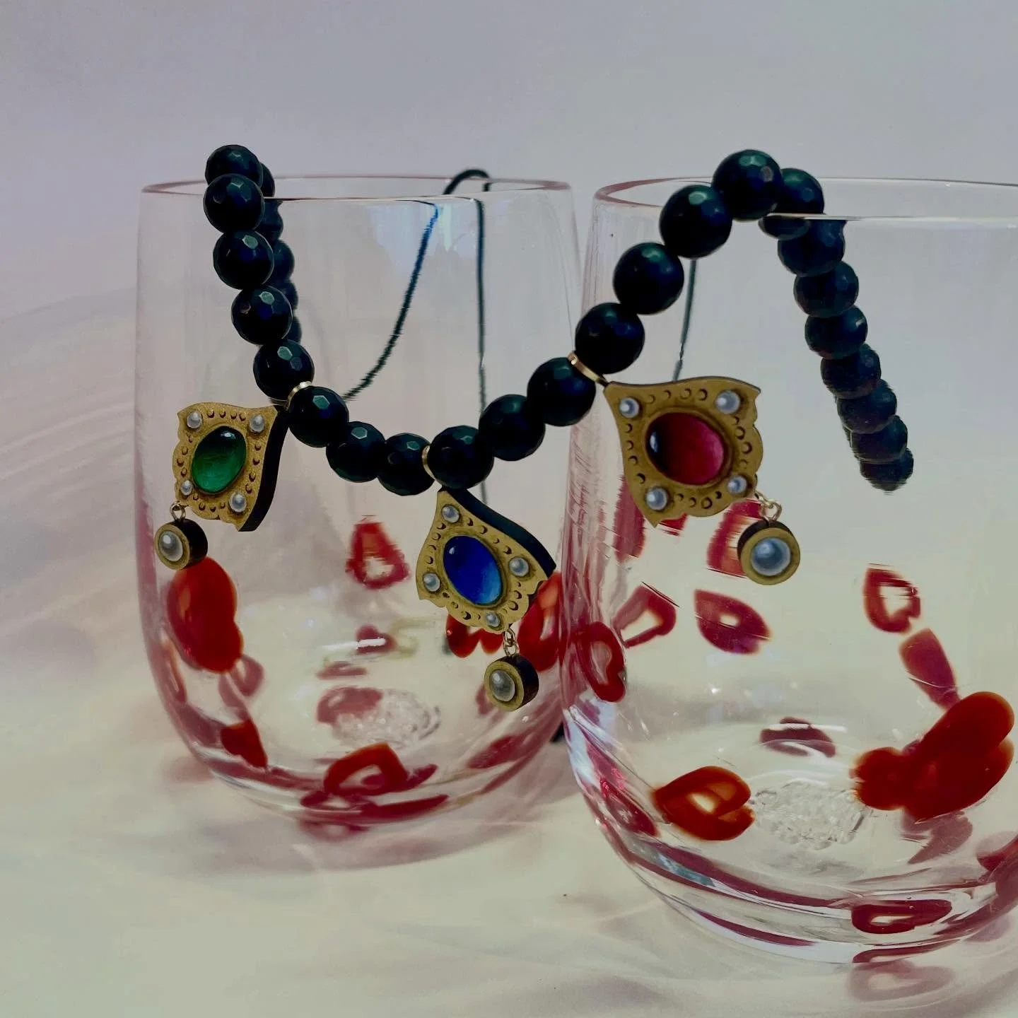 Fabulous and funky jewelry and glassware make some of the most perfect holiday gifts 🎁❣️

This hand painted necklace by @christinagoodman_ and these heart glasses by @bayblownglass have us swooning 😍 check out these pieces and many more today!

Sto