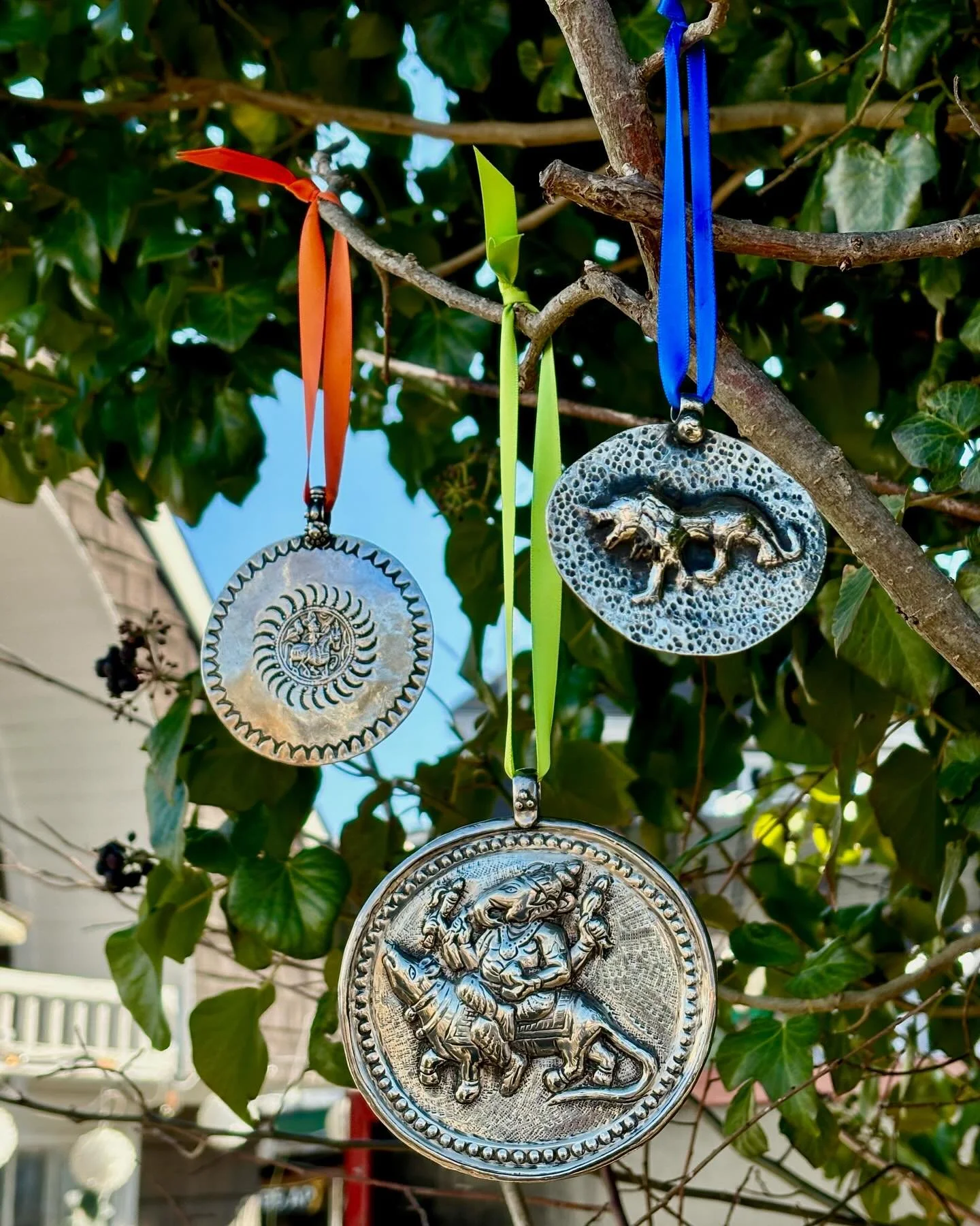 Adorn your home with these eye catching medallions! 🦁☀️

We have a wide array of unique sterling silver pieces at the gallery; pendants, earrings, cups and so much more. 🩶✨💫

We&rsquo;re open 10-5 Tuesday through Saturday, come take a peek at our 