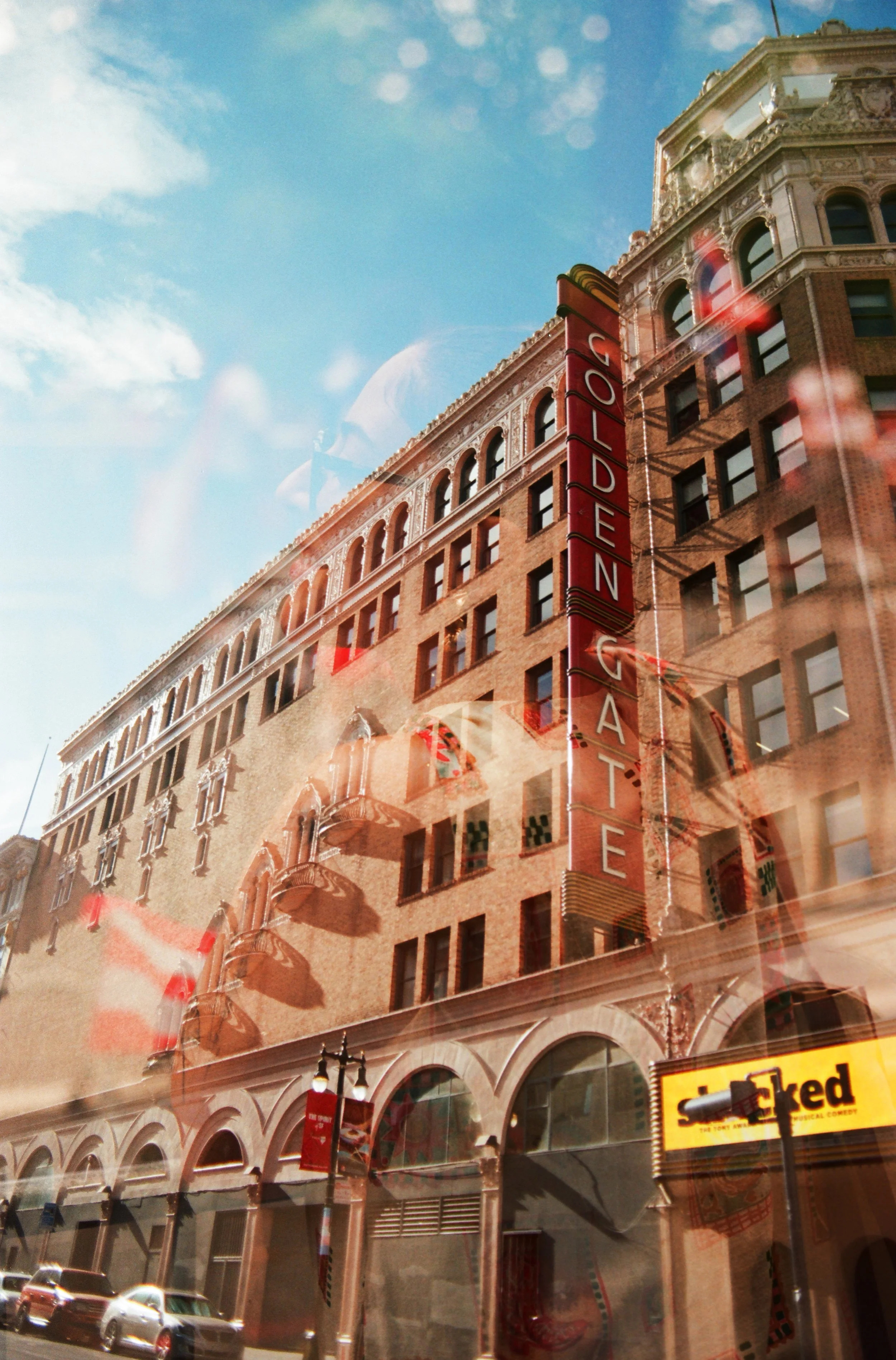 Double exposure featuring SF and NY.