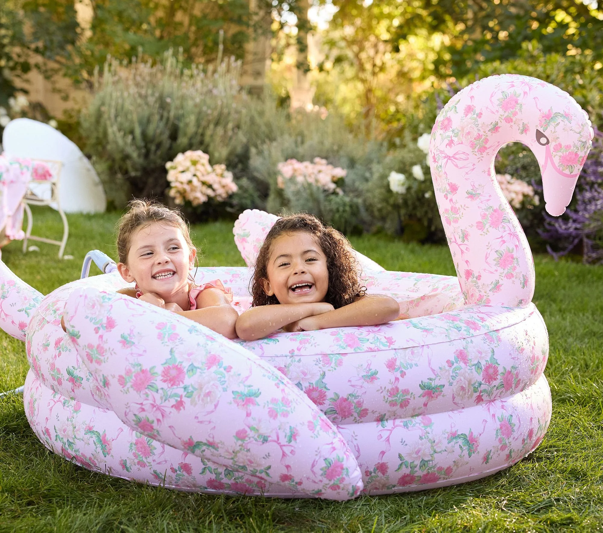 loveshackfancy-inflatable-swan-pool-3-xl.jpg