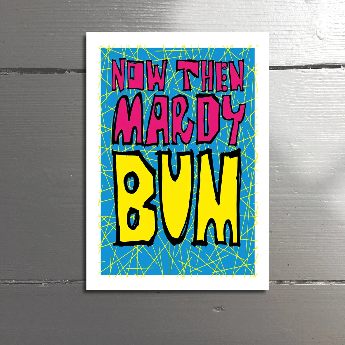 MARDY BUM - A northern term for a sulky, petulant and grumpy git. A moderate twat. Blank inside.