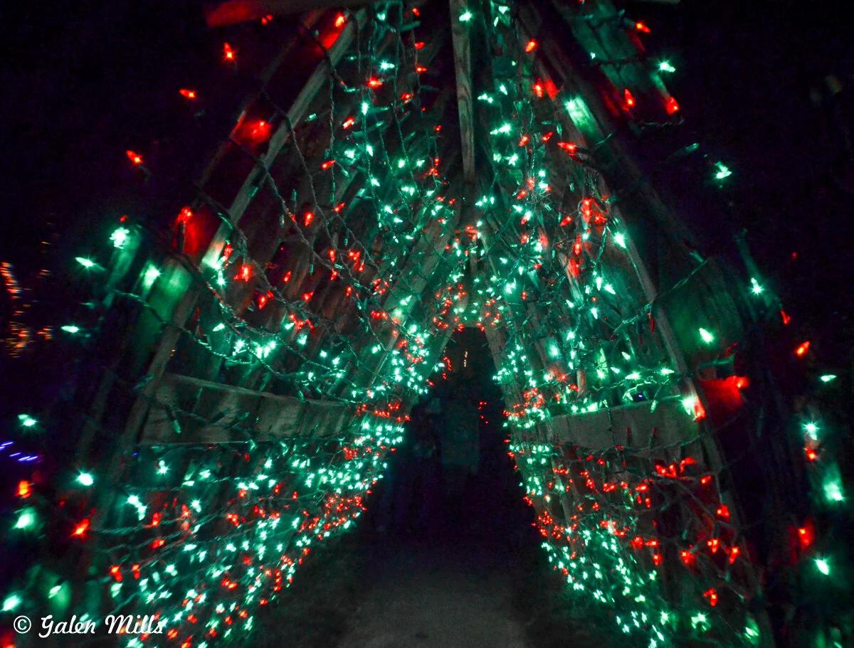 Tunnel with red and green holiday lights