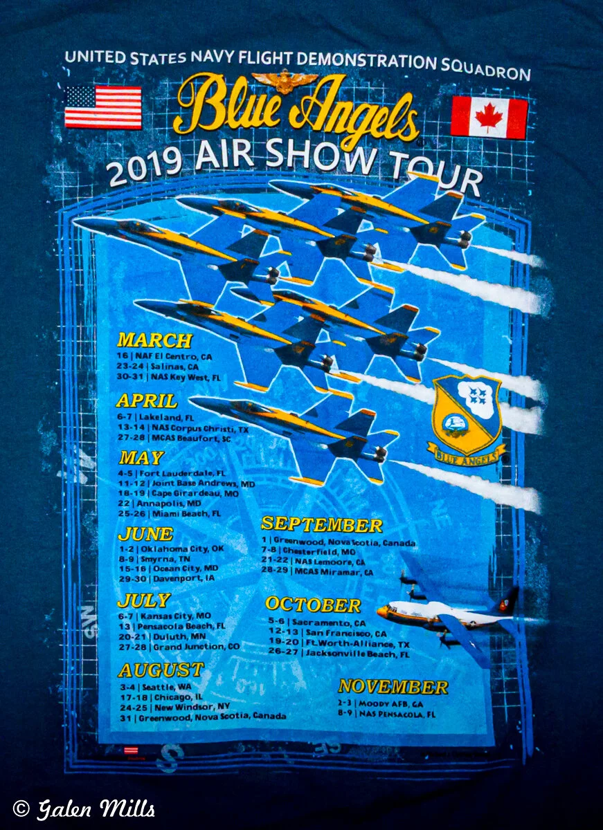 Blue Angels 2019 Air Show Tour shirt featuring jet illustrations, schedule, and U.S. and Canadian flags.