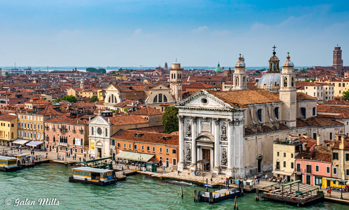 Aerial view of Venice with Santa Maria della Visitazione church and buildings along the waterfront.