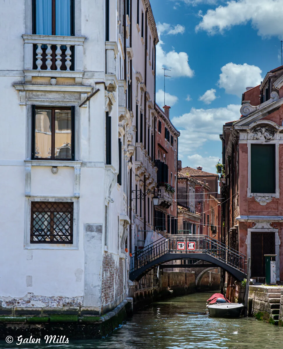Venetian canal with bridge and buildings