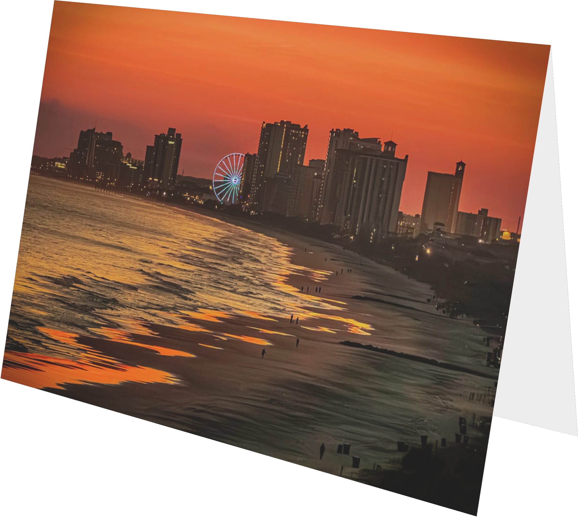 Sunset over a city with high-rise buildings along the ocean, a ferris wheel illuminated, and reflections of the sky and buildings on the water.