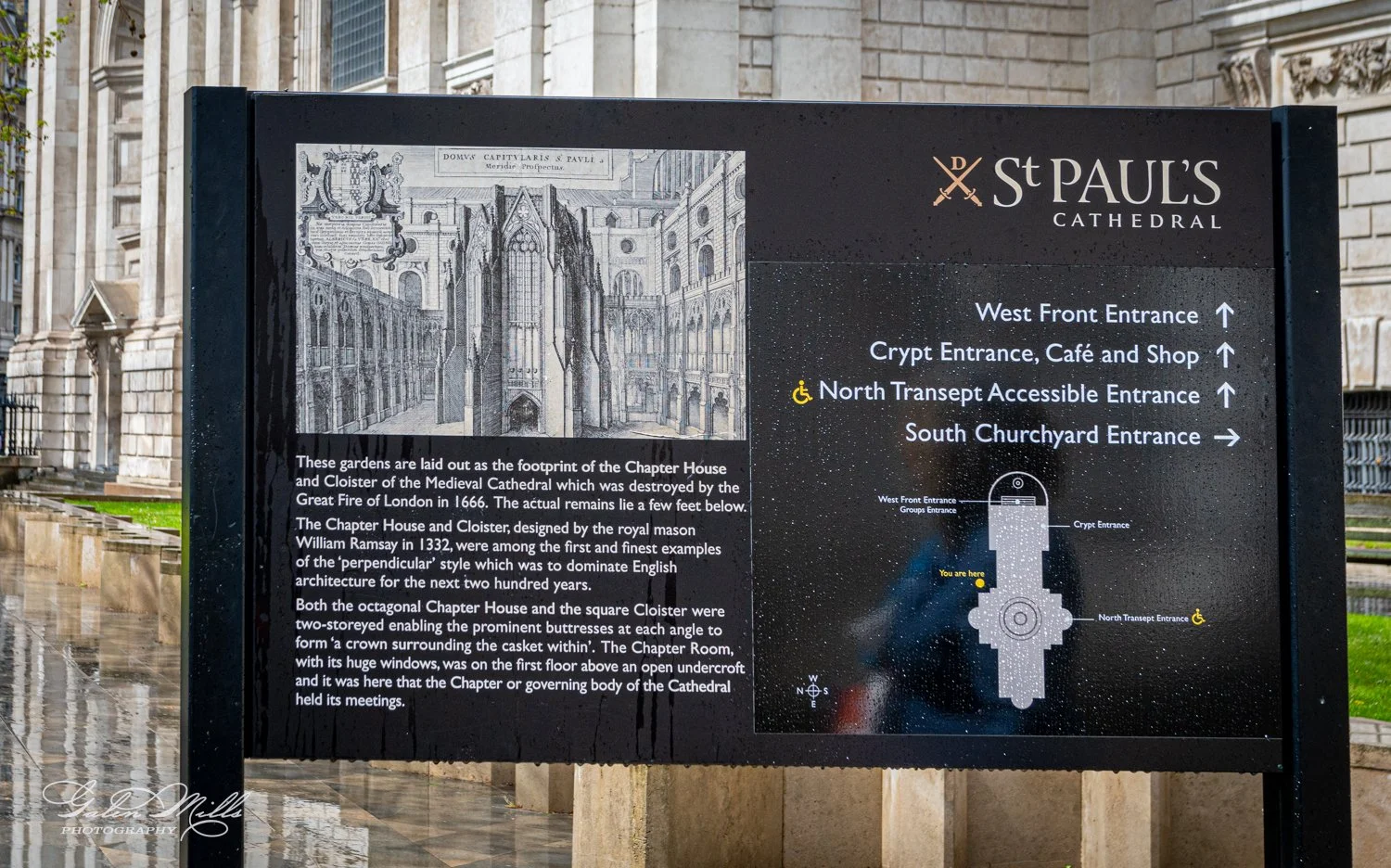 Informational sign at St. Paul's Cathedral detailing historical background and entrances, including a map and directions to various entrances like the West Front and Crypt Entrance. Features a sketch of the cathedral's interior and text about the med