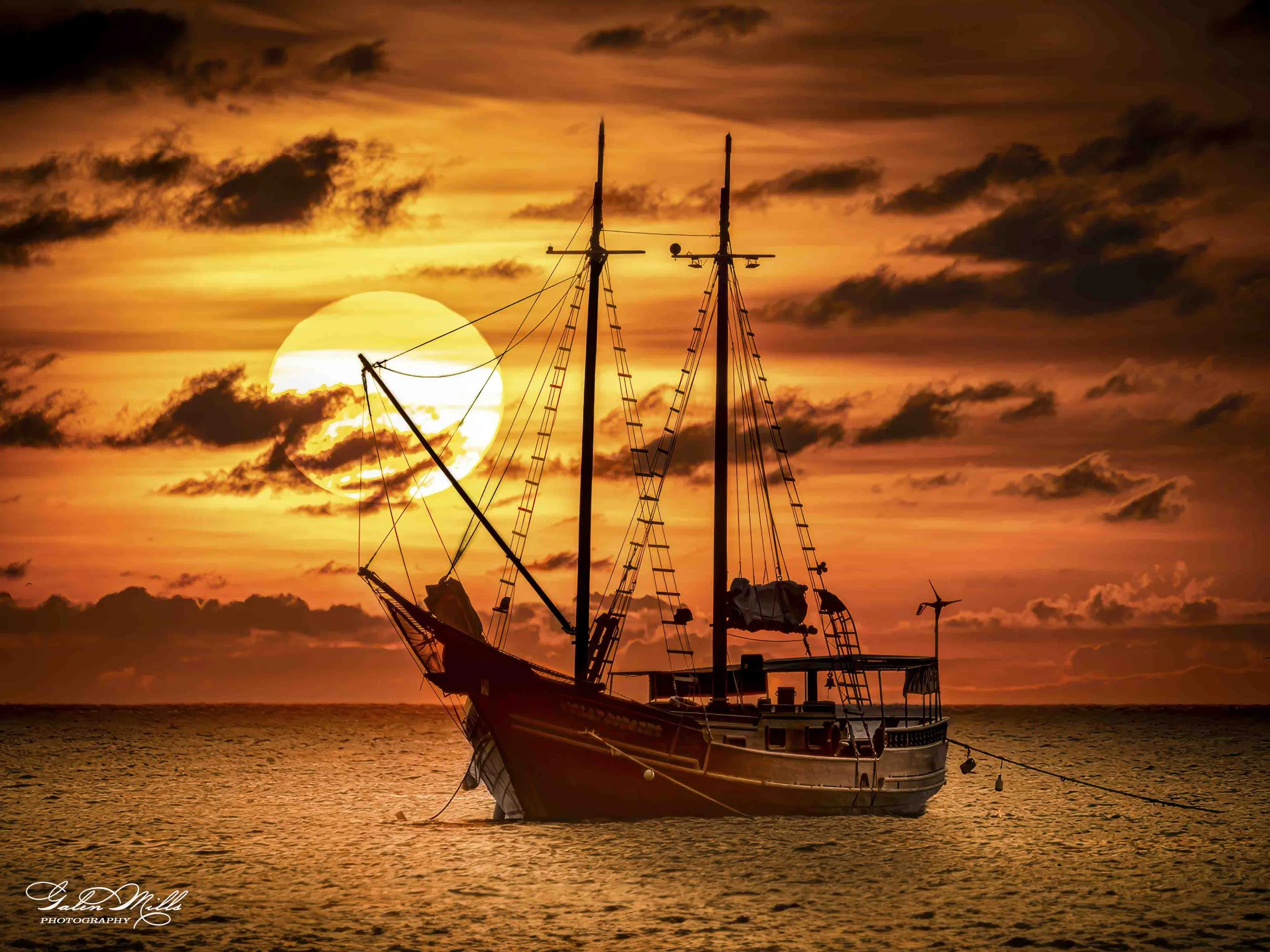 Sailing ship on Aruba sunset