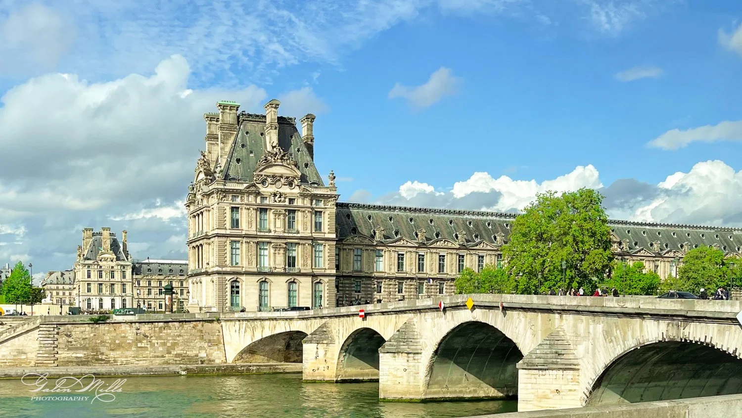 Historic French building and bridge over a river