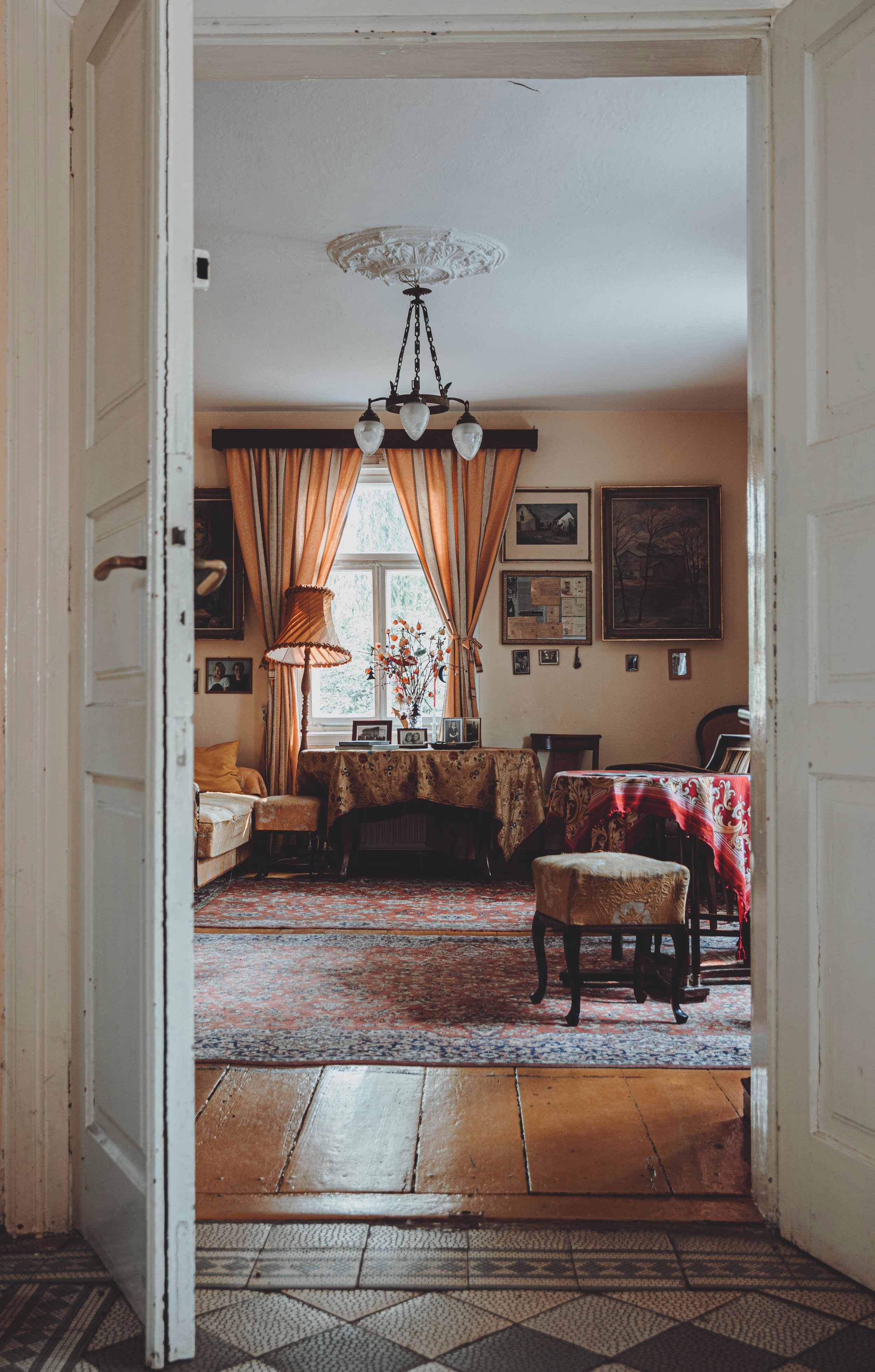 brown wooden table near brown wooden armchair