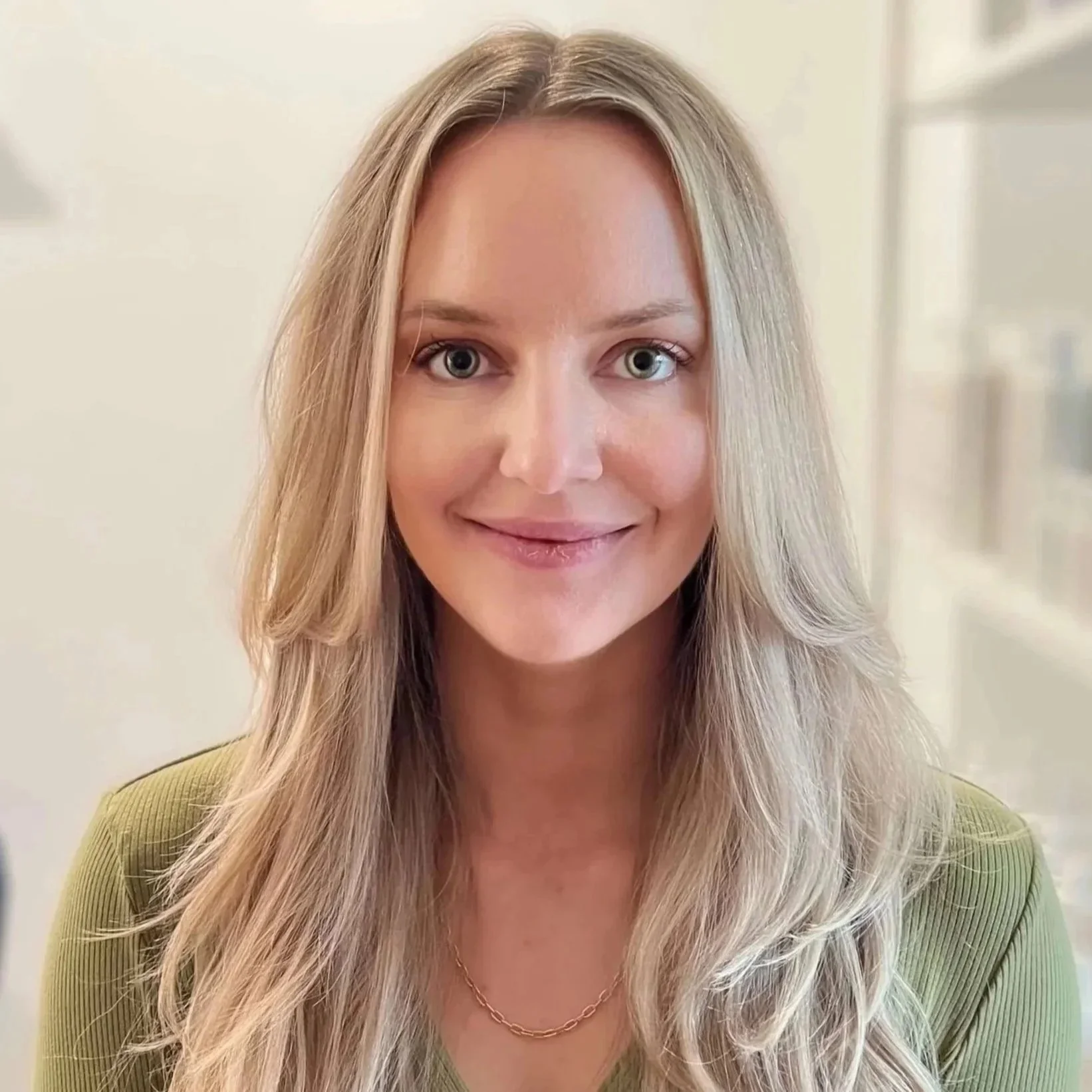 Natural-looking blonde color with face-framing brightness at Kindred Color Studio
