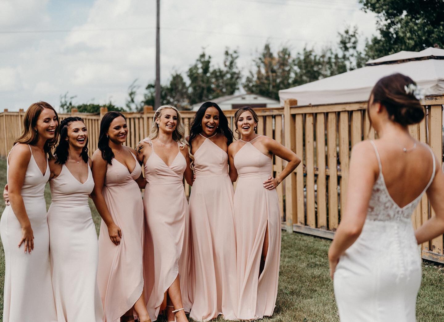We are all 😍 😍 😍 for this dress reveal shot captured by the fabulous @pictureandpoet ~ such a tight knit group of women, you can feel ALL their love for R on her wedding day 💕