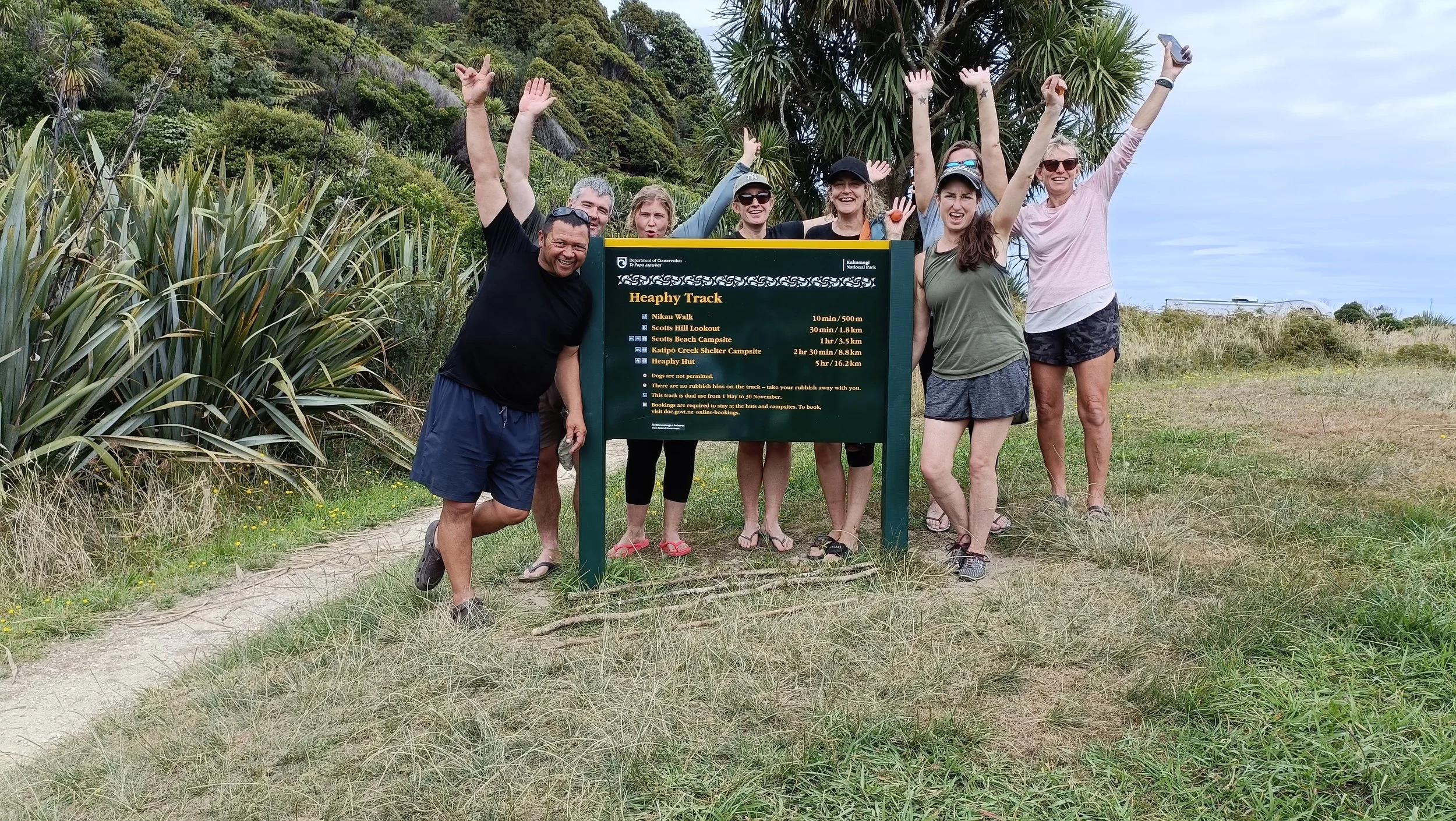 8 trampers walking the Heaphy track in Tasman New Zealand