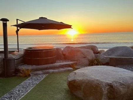 Sunset & spa along West Coast South Island. Part of our Heaphy Track Shuttle package